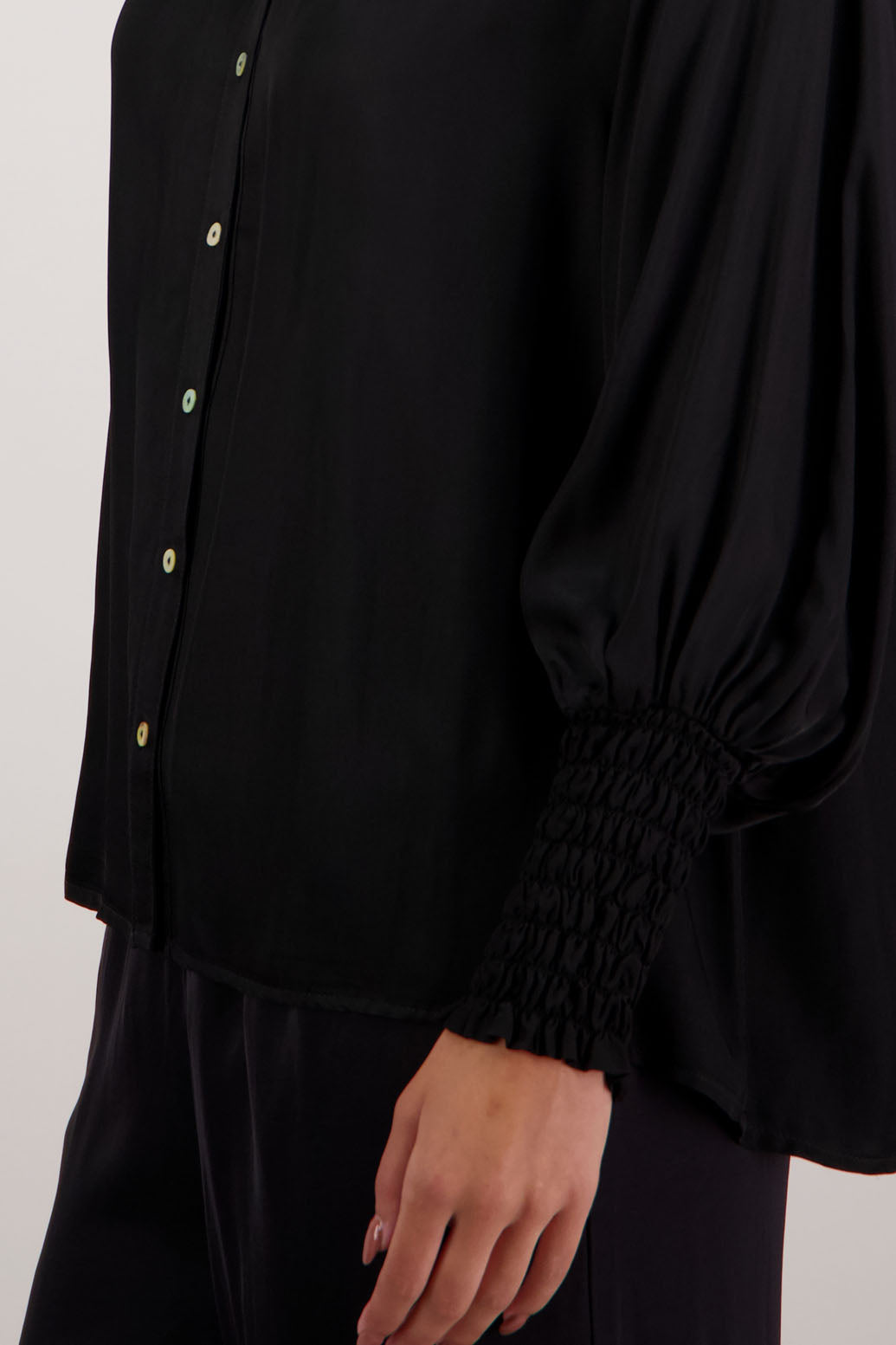 Bestseller. Audrey Shirt in Black by Briarwood NZ. 100% viscose shirt with full length sleeves, ruffle around neck, button through, shirred wrists