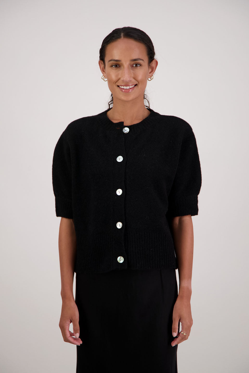 Fancy Cardigan in Black by Briarwood NZ. Alpaca/Wool blend short sleeve cardigan with buttoned front and wide waist band