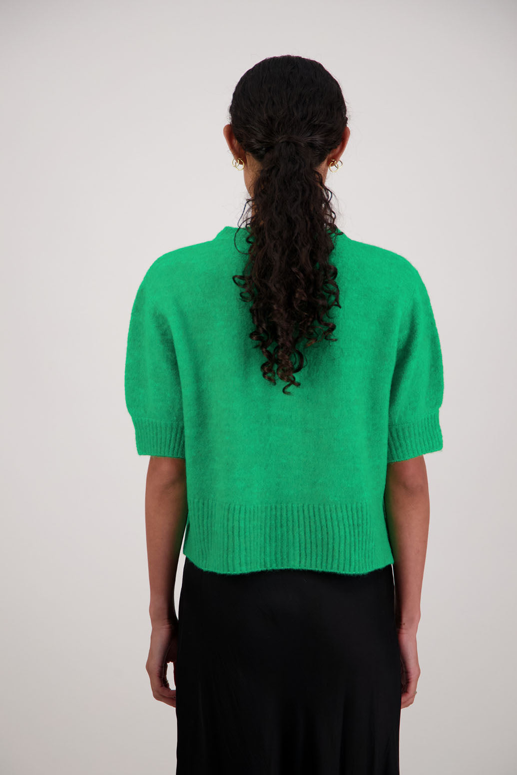 Fancy Cardigan in Green by Briarwood NZ. Alpaca/Wool blend short sleeve cardigan with buttoned front and wide waist band