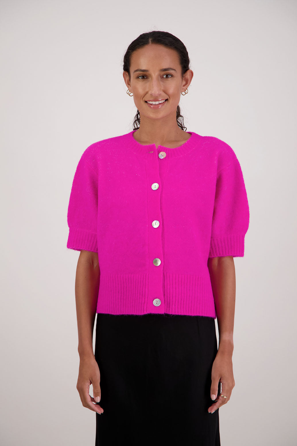 Fancy Cardigan in Pink by Briarwood NZ. Alpaca/Wool blend short sleeve cardigan with buttoned front and wide waist band