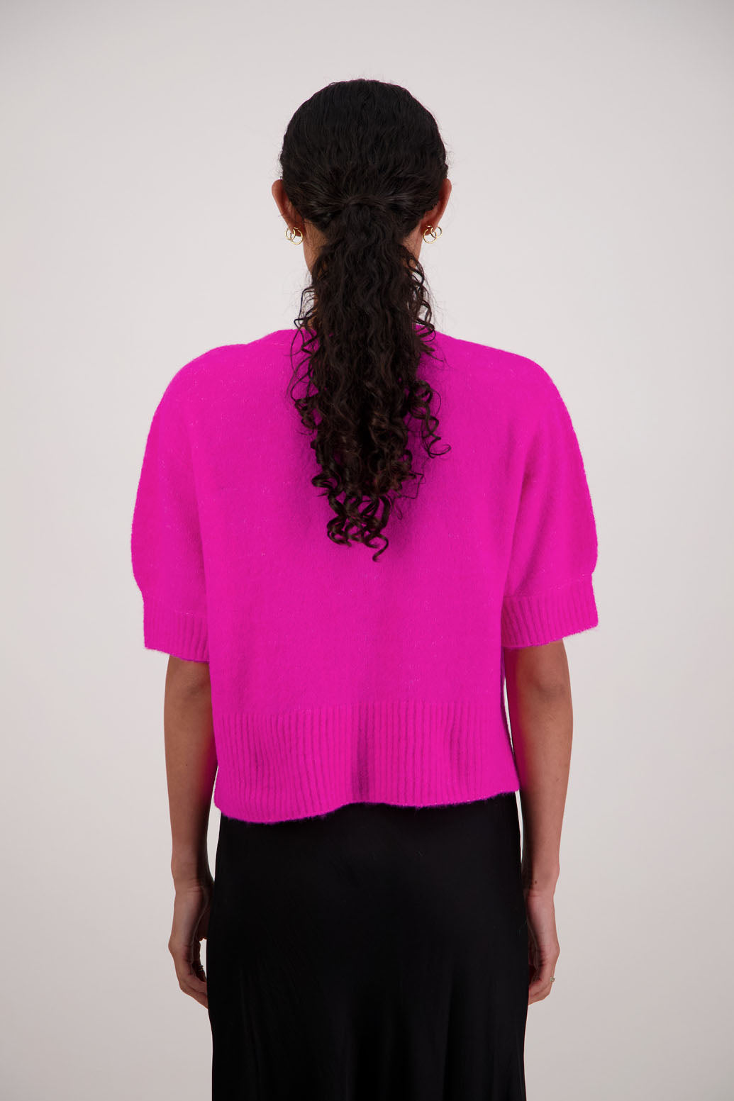 Fancy Cardigan in Pink by Briarwood NZ. Alpaca/Wool blend short sleeve cardigan with buttoned front and wide waist band