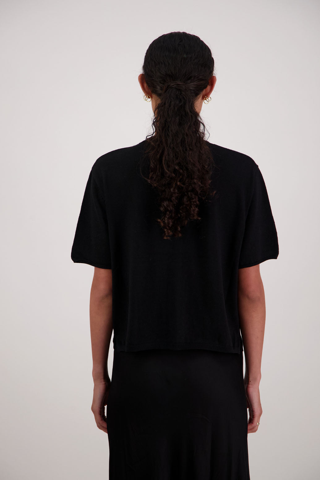 Felix Wool Cardigan in Black by Briarwood NZ. 100% Wool cardigan with short sleeves, buttoned front, box fit