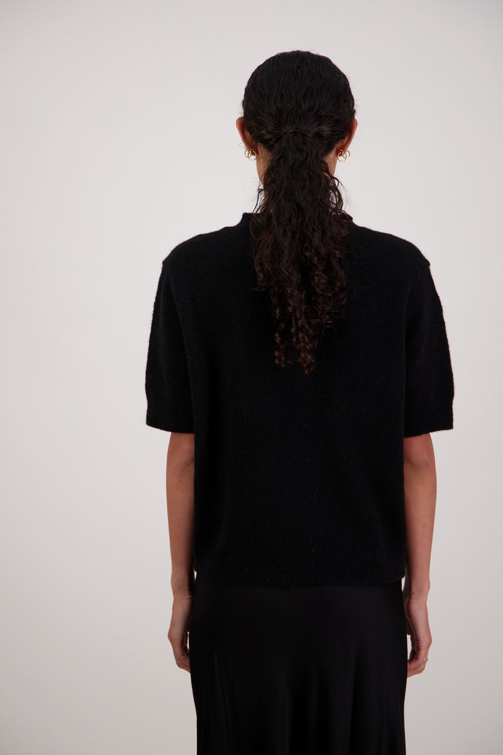 Fleur Top in Black by Briarwood NZ. Alpaca/Wool blend top with high neck, short sleeve t-shirt style, semi-fitted