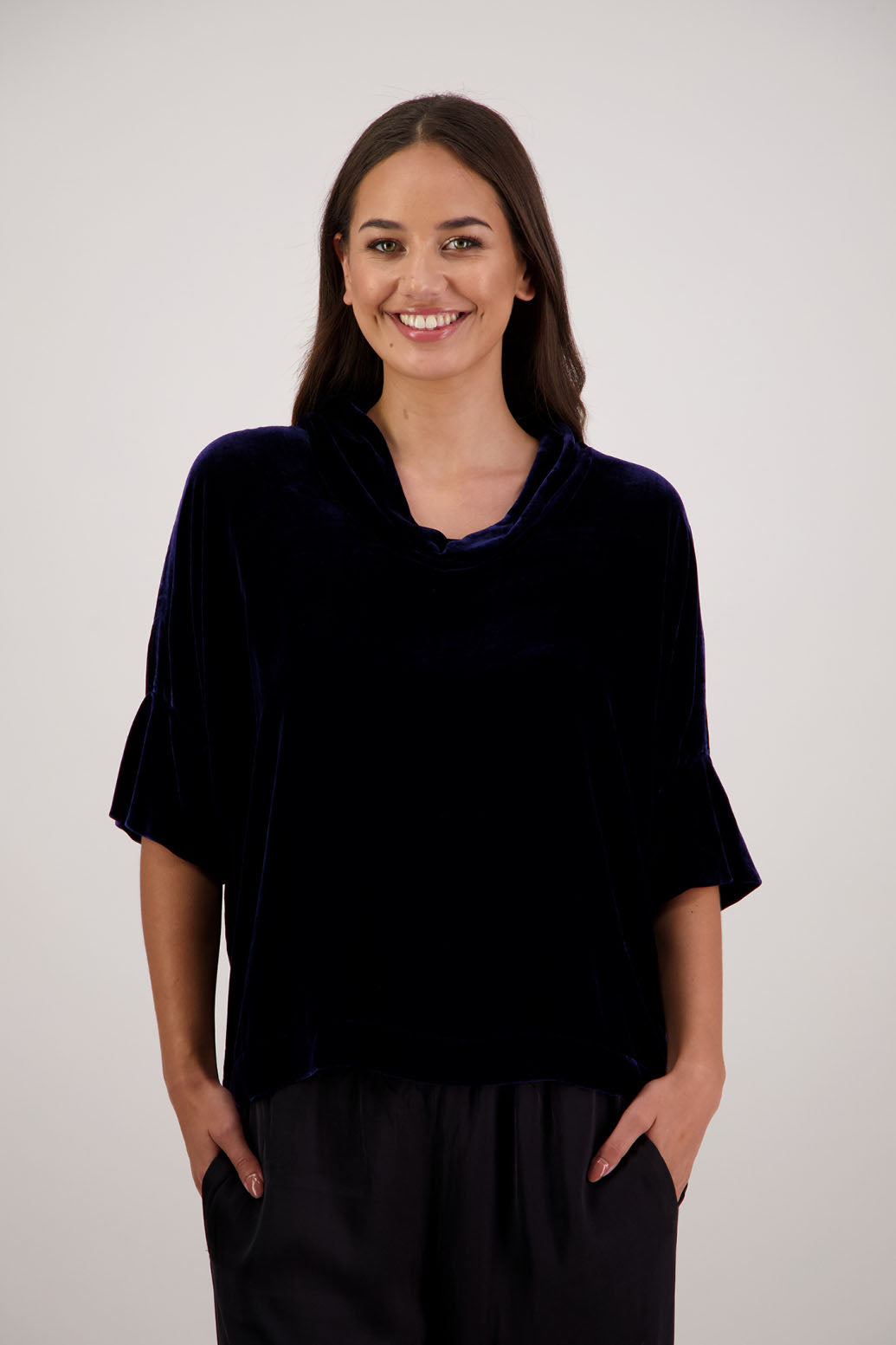 Bestseller. Hanley Top in Ink Velvet by Briarwood NZ. A
18% Silk, 82% Rayon Velvet Top with roll neck, 3/4 sleeves, split hem, loose fit, longer at the back