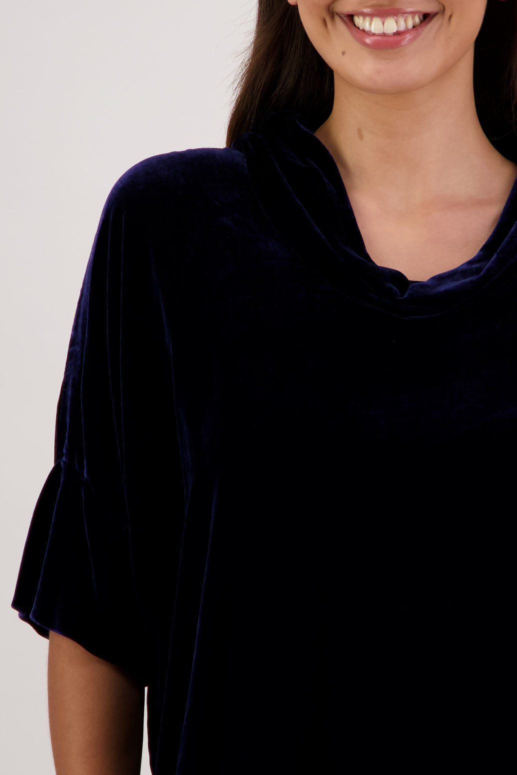 Bestseller. Hanley Top in Ink Velvet by Briarwood NZ. A
18% Silk, 82% Rayon Velvet Top with roll neck, 3/4 sleeves, split hem, loose fit, longer at the back