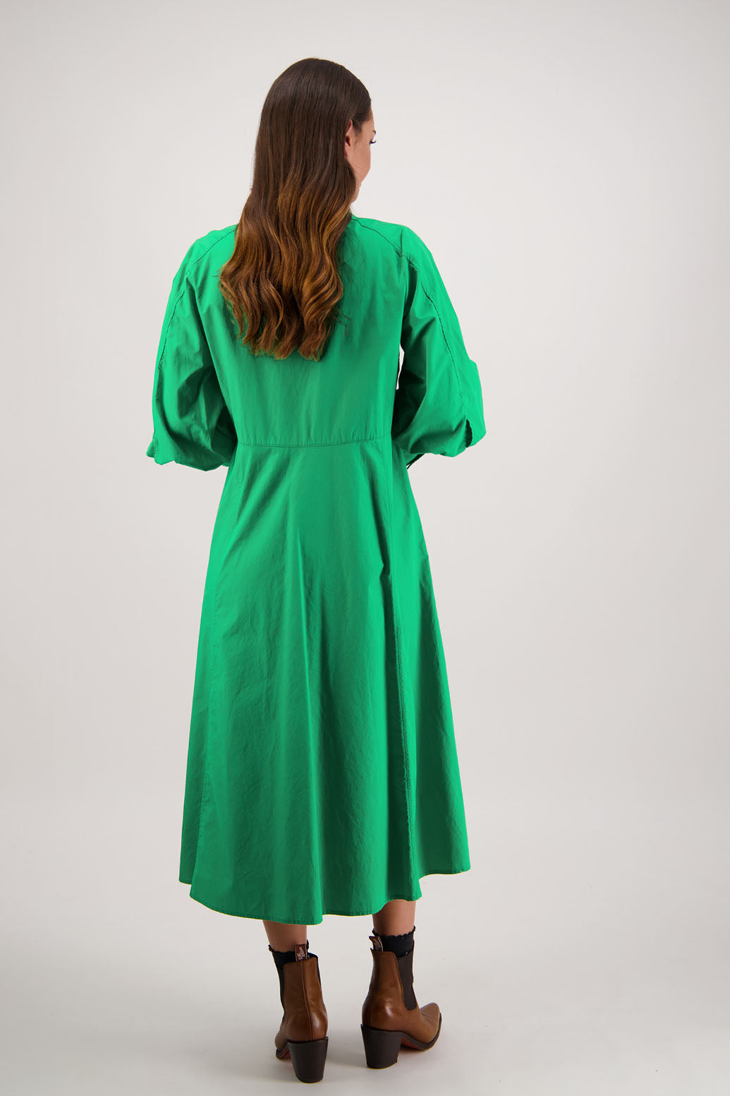 Henrietta Shirt Dress in Apple by Briarwood NZ. Made from Cotton Poplin with long full length sleeves, fitted through the body, fitted through the maxi with maxi a-line skirt, hidden button front and extended cuff with 2 buttons