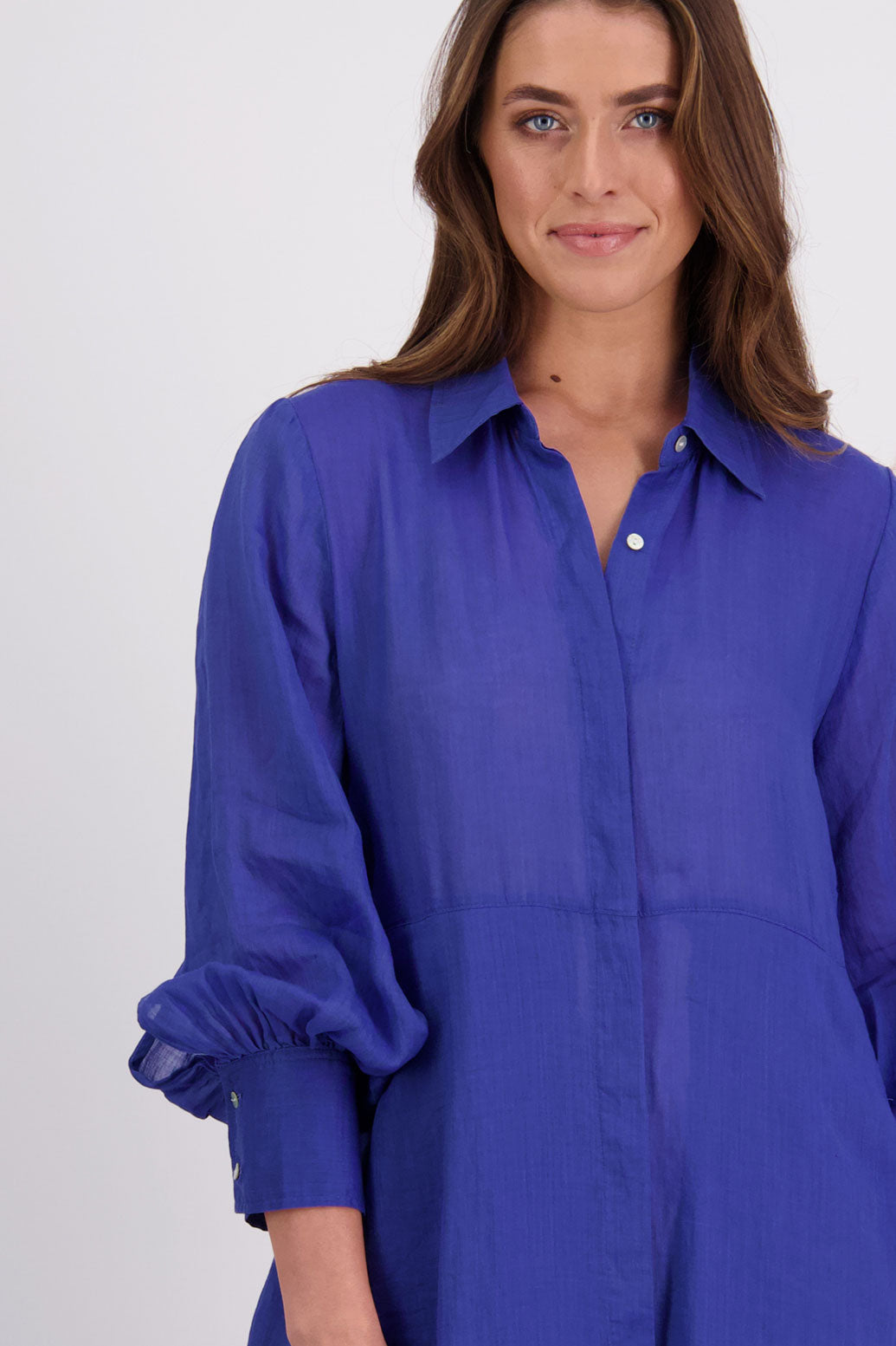 Briarwood Ramie Shirt Dress with long sleeves, hidden button front and maxi length. Hollie Bright Blue
