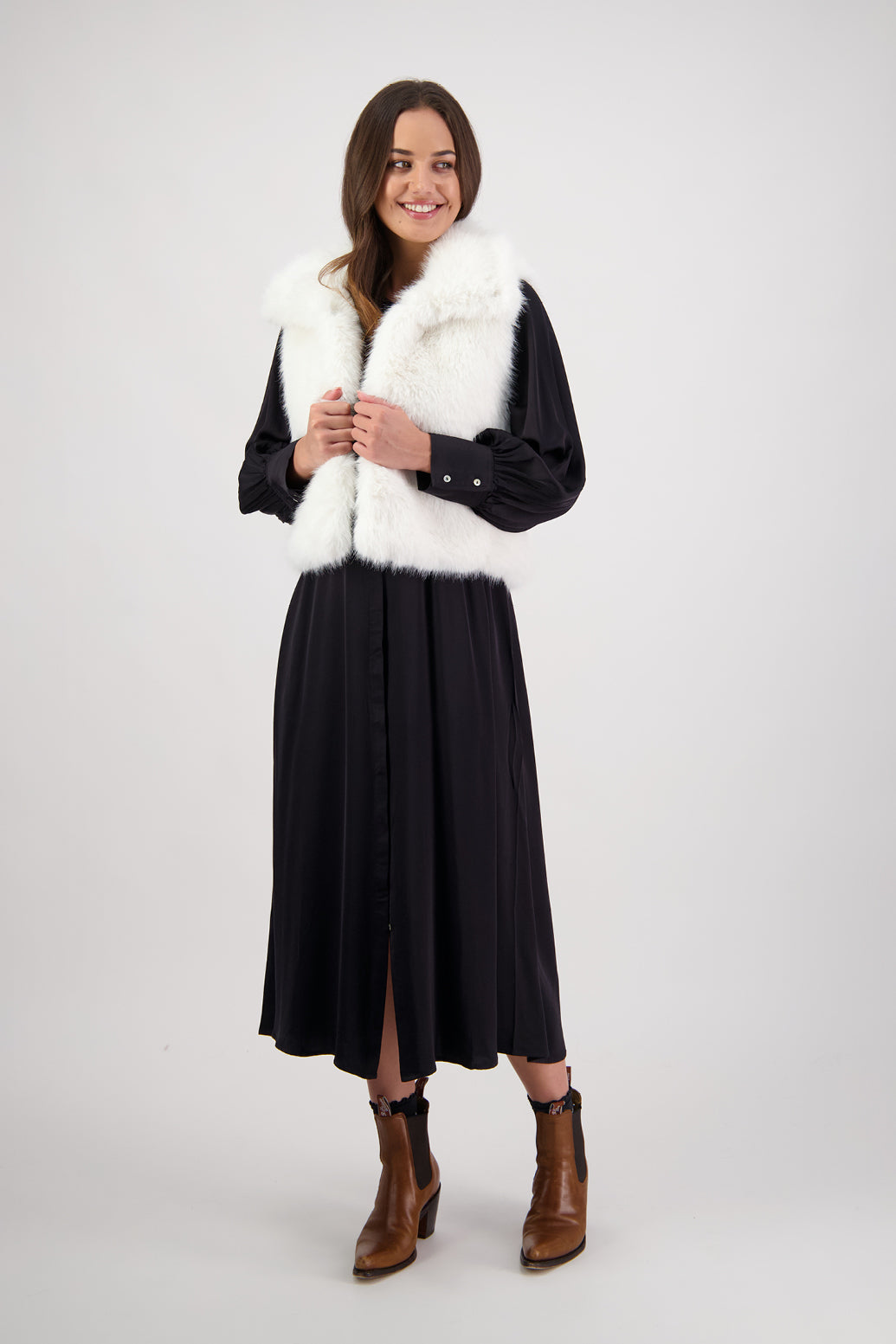 Hollie Black Shirt Dress by Briarwood NZ. 100% Viscose shirt dress with long full length sleeves, fitted through the body, A-line skirt, Hidden button down front, extended cuff with 2 button closure