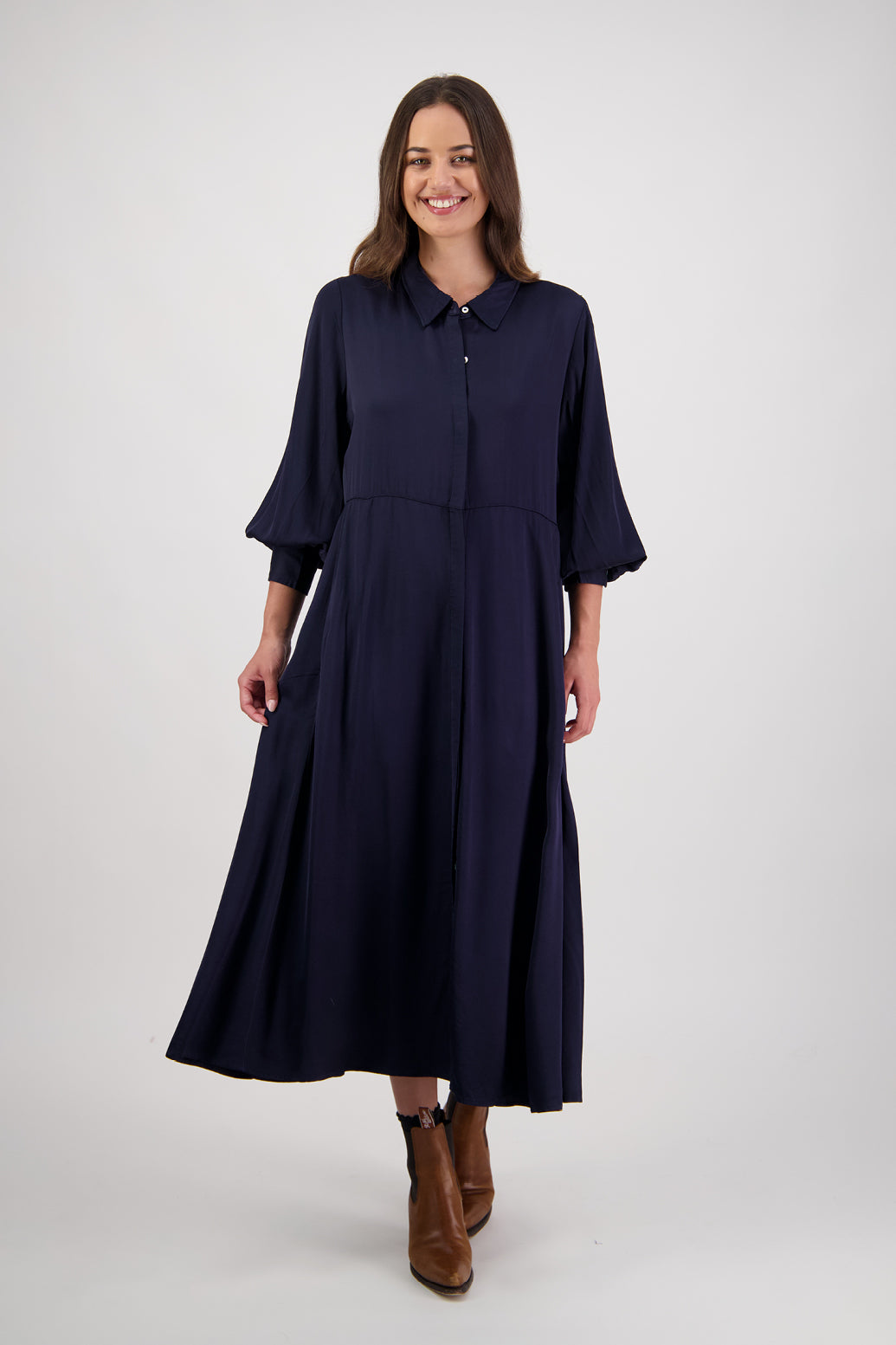 Hollie Ink Shirt Dress by Briarwood NZ. 100% Viscose shirt dress with long full length sleeves, fitted through the body, A-line skirt, Hidden button down front, extended cuff with 2 button closure