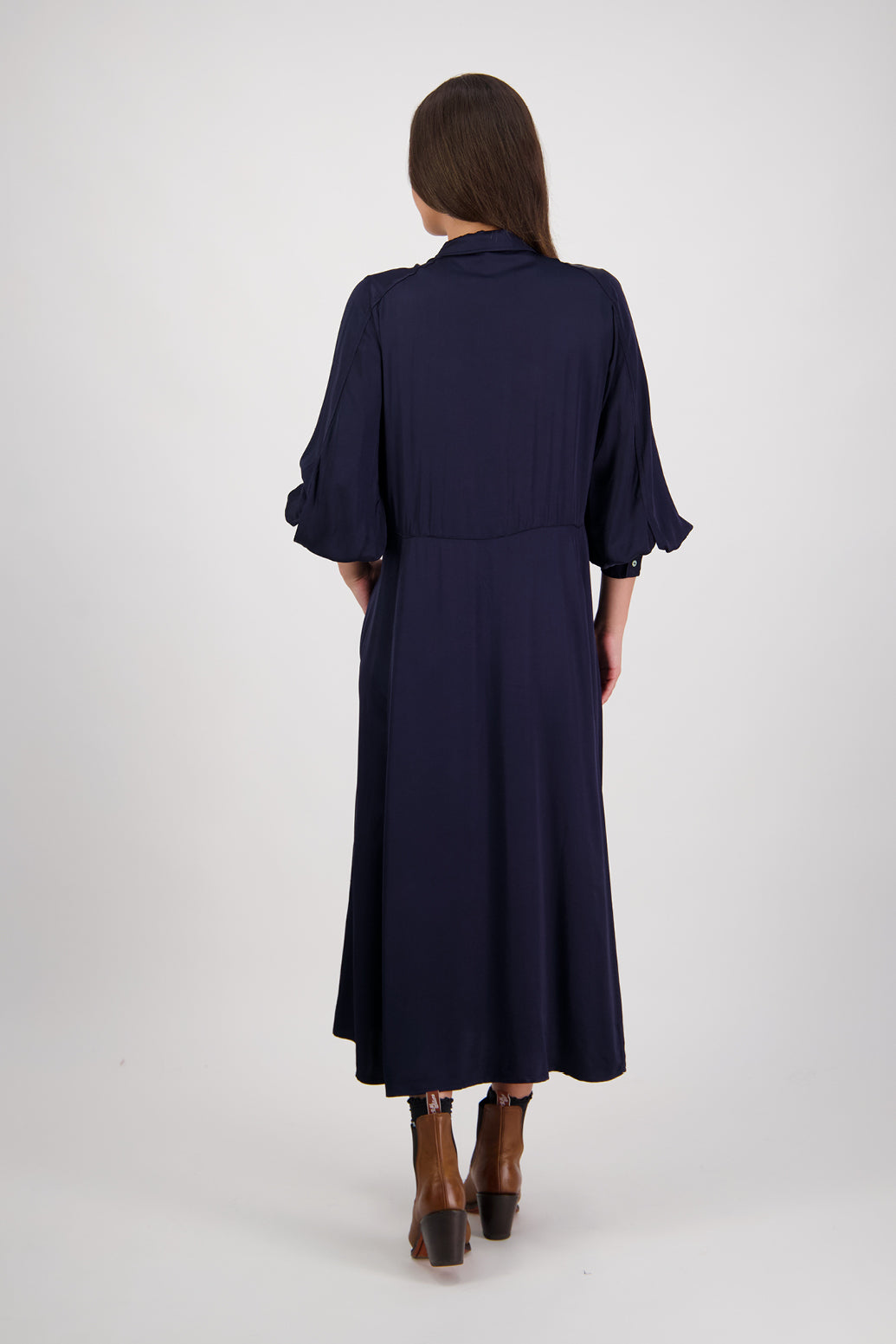 Hollie Ink Shirt Dress by Briarwood NZ. 100% Viscose shirt dress with long full length sleeves, fitted through the body, A-line skirt, Hidden button down front, extended cuff with 2 button closure