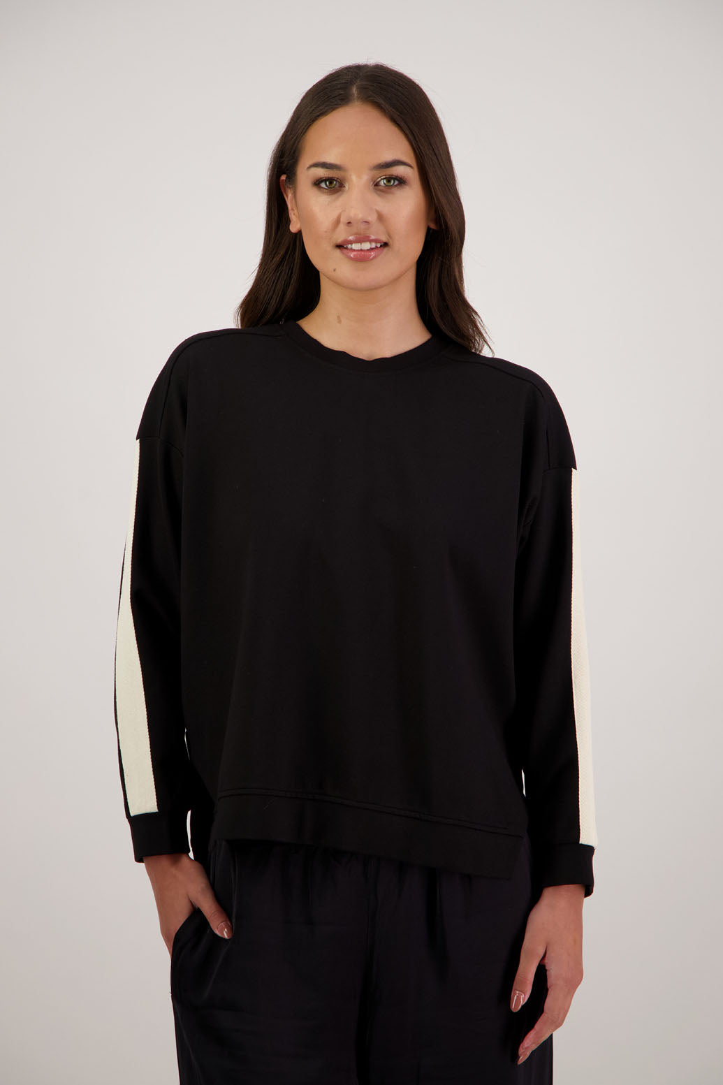 BESTSELLER. Holmes Sweatshirt in Black by Briarwood NZ. Ponte sweatshirt with full length sleeves, side split hem and contrast side stripe
