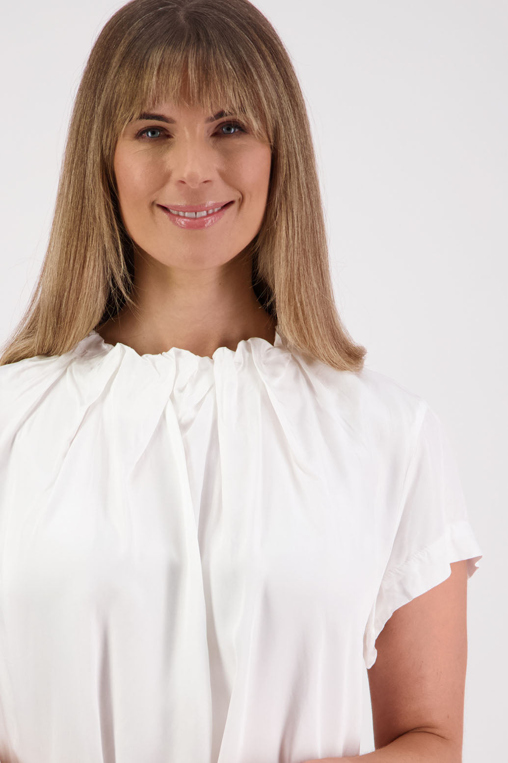 Womens Ivory Viscose Top. Short sleeves with soft pleats around neck. Briarwood NZ. Jackie