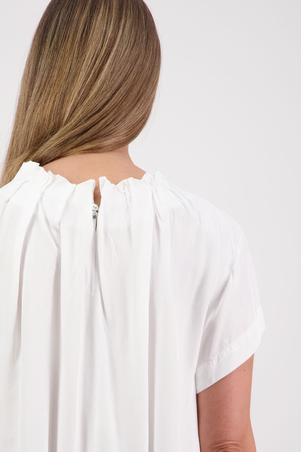 Womens Ivory Viscose Top. Short sleeves with soft pleats around neck. Briarwood NZ. Jackie