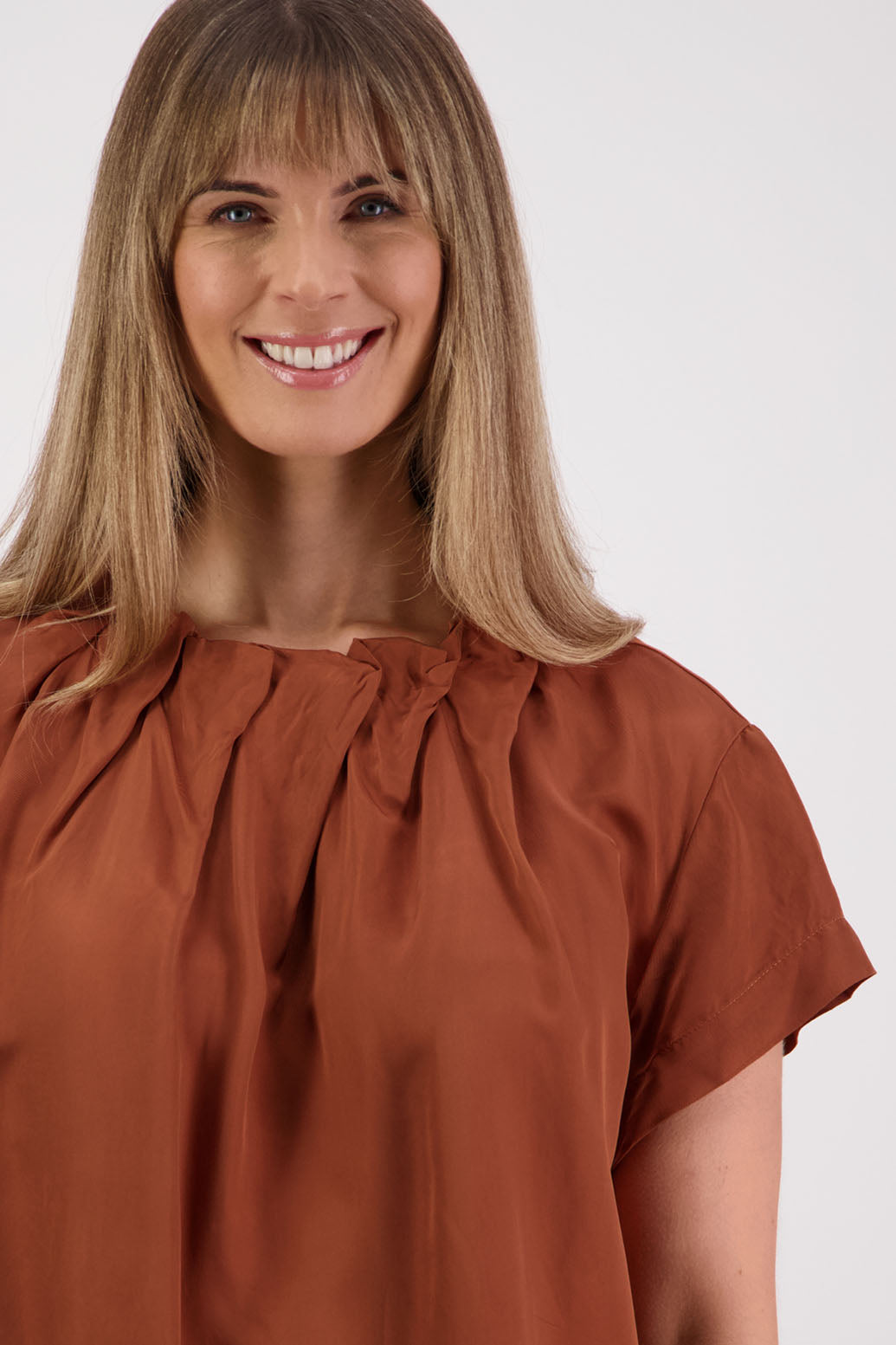 Womens Tan Top. Short sleeves with soft pleats around neck. Briarwood NZ. Jackie
