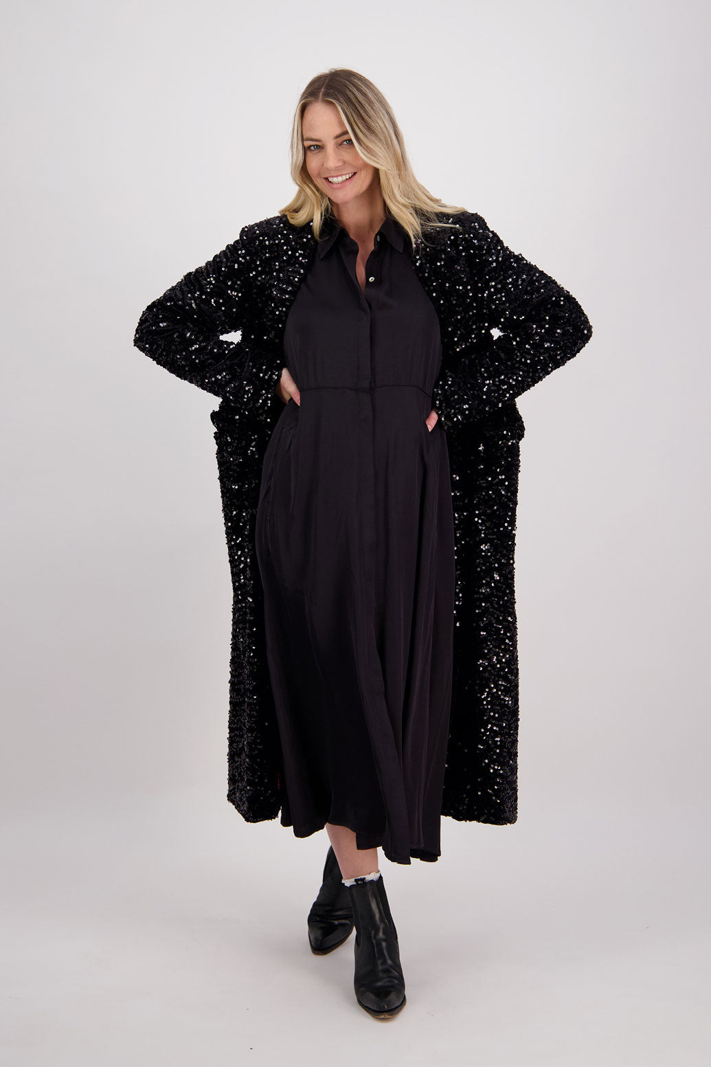 Briarwood classic sequin longline coat with fuchsia lining. Hunter
