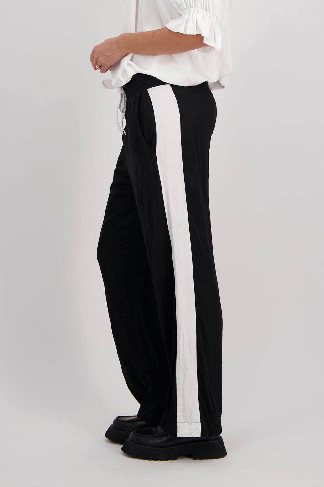 Black Briarwood wide leg pant with White/Ivory stripe down leg. Madi