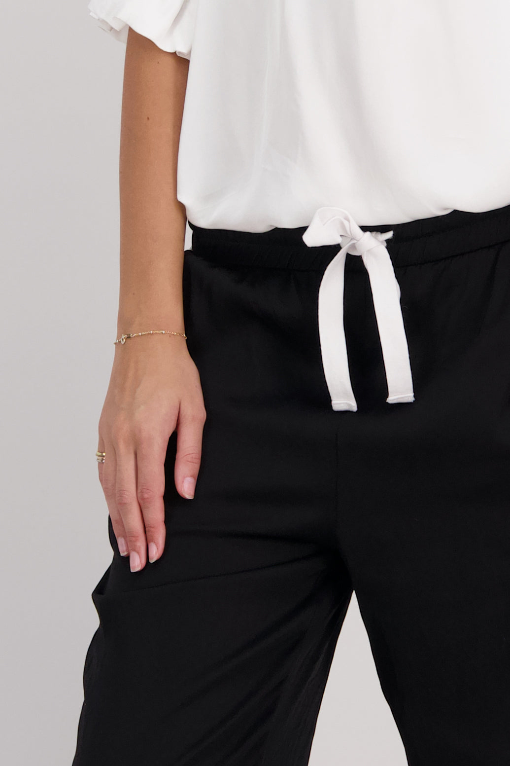 Black Briarwood wide leg pant with White/Ivory stripe down leg. Madi
