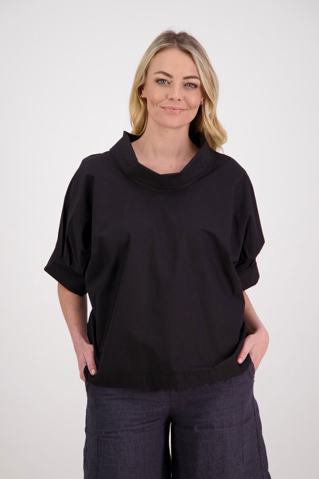 Padget short sleeve roll neck top with bat wing sleeves. Black, Cotton