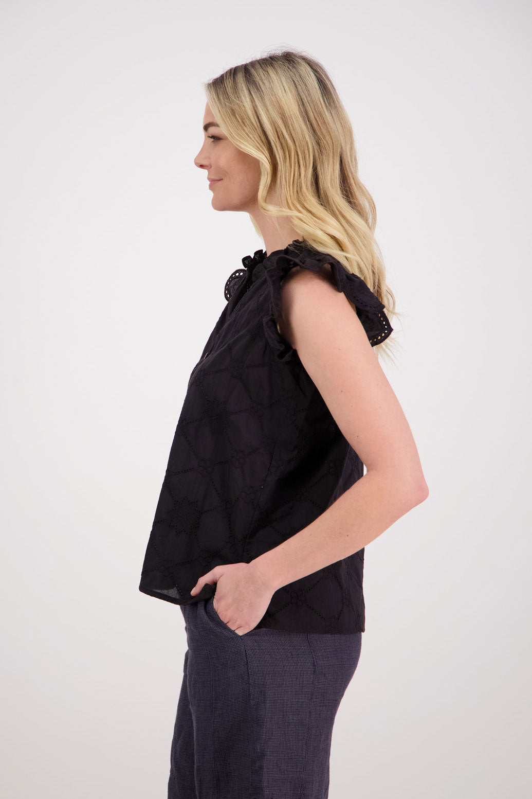 Page Womens Black Embroidery Anglaise Top With Ruffle Sleeves. Slight ruffle around the neck and slightly longer at the back.