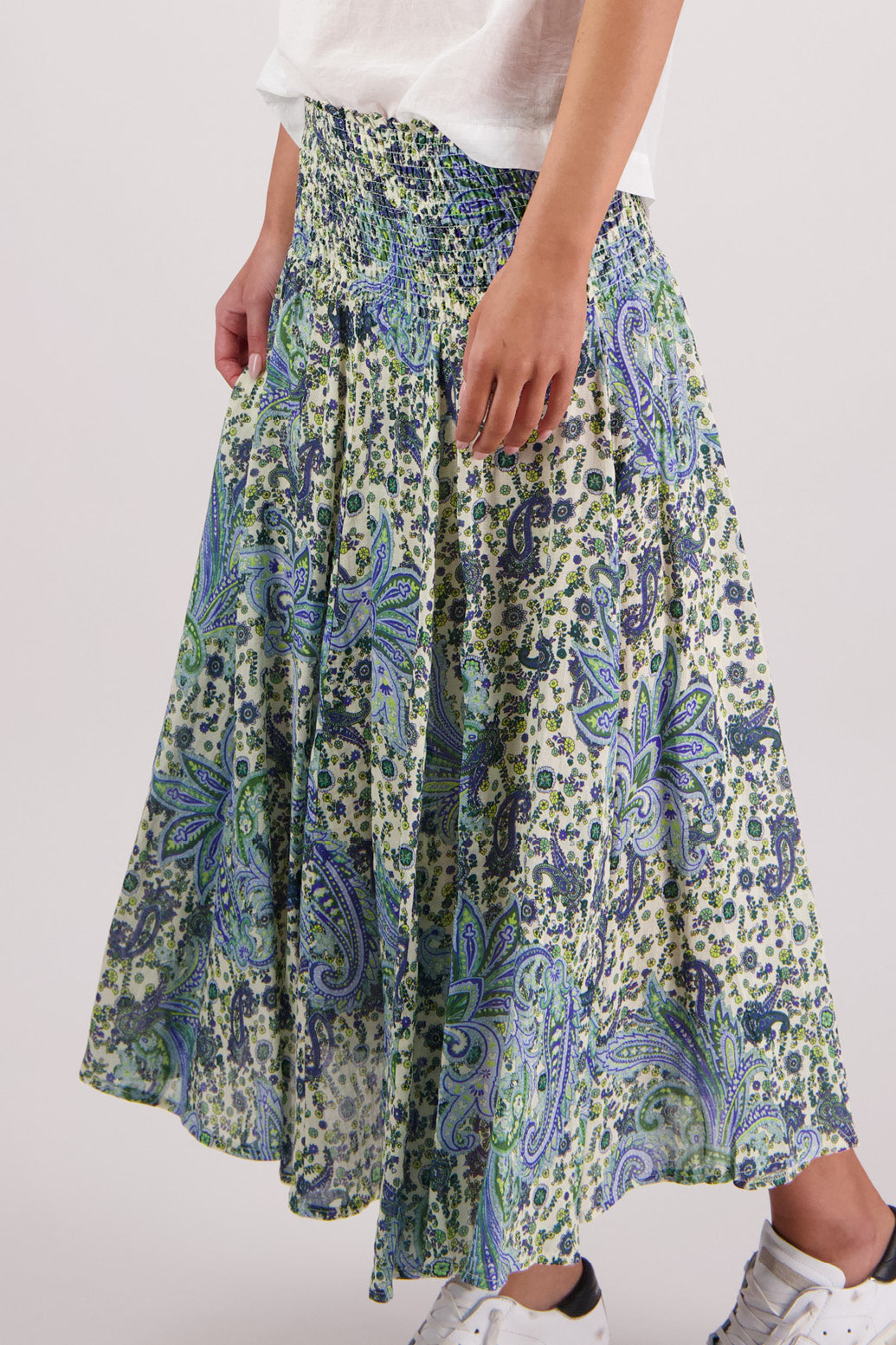 Close up of side view of Briarwood Pandora Skirt in Blue Paisley print.