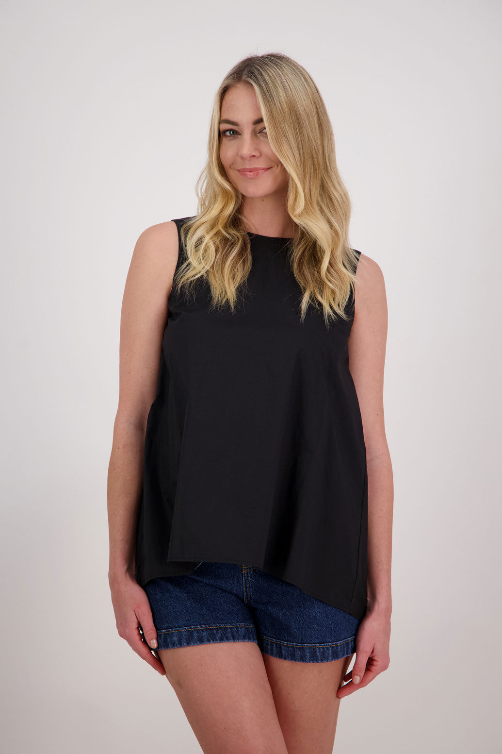 Patsy sleeveless wide shoulder twist back top in Cotton, Black