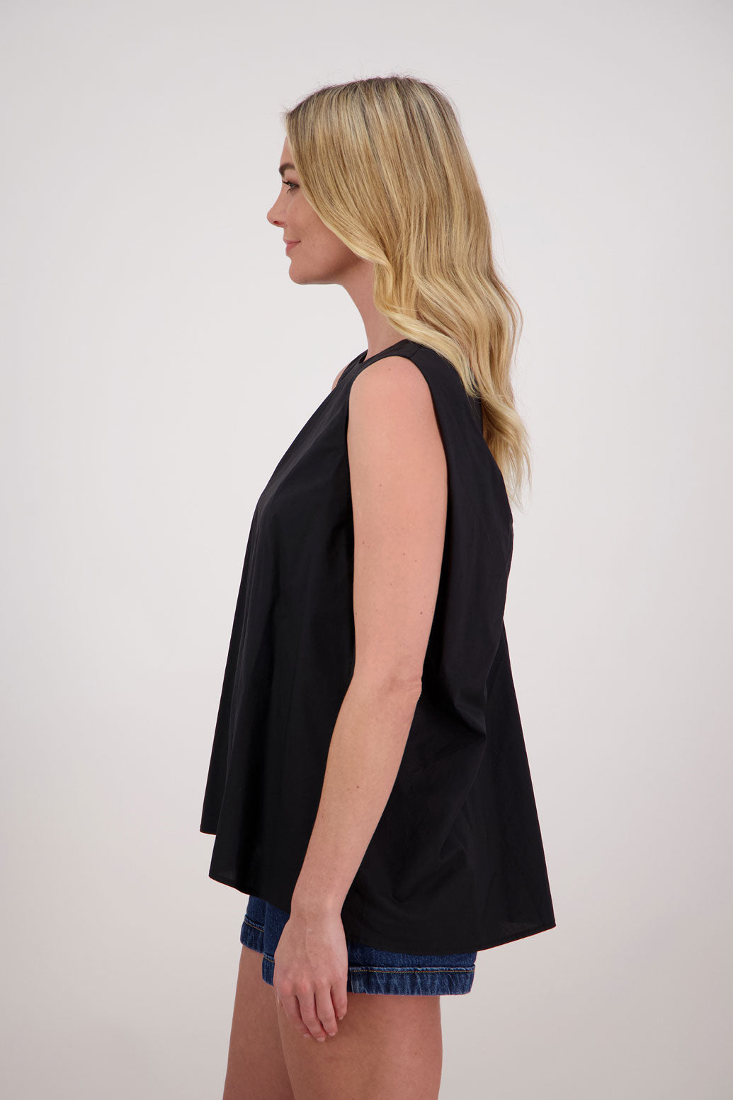 Patsy sleeveless wide shoulder twist back top in Cotton, Black