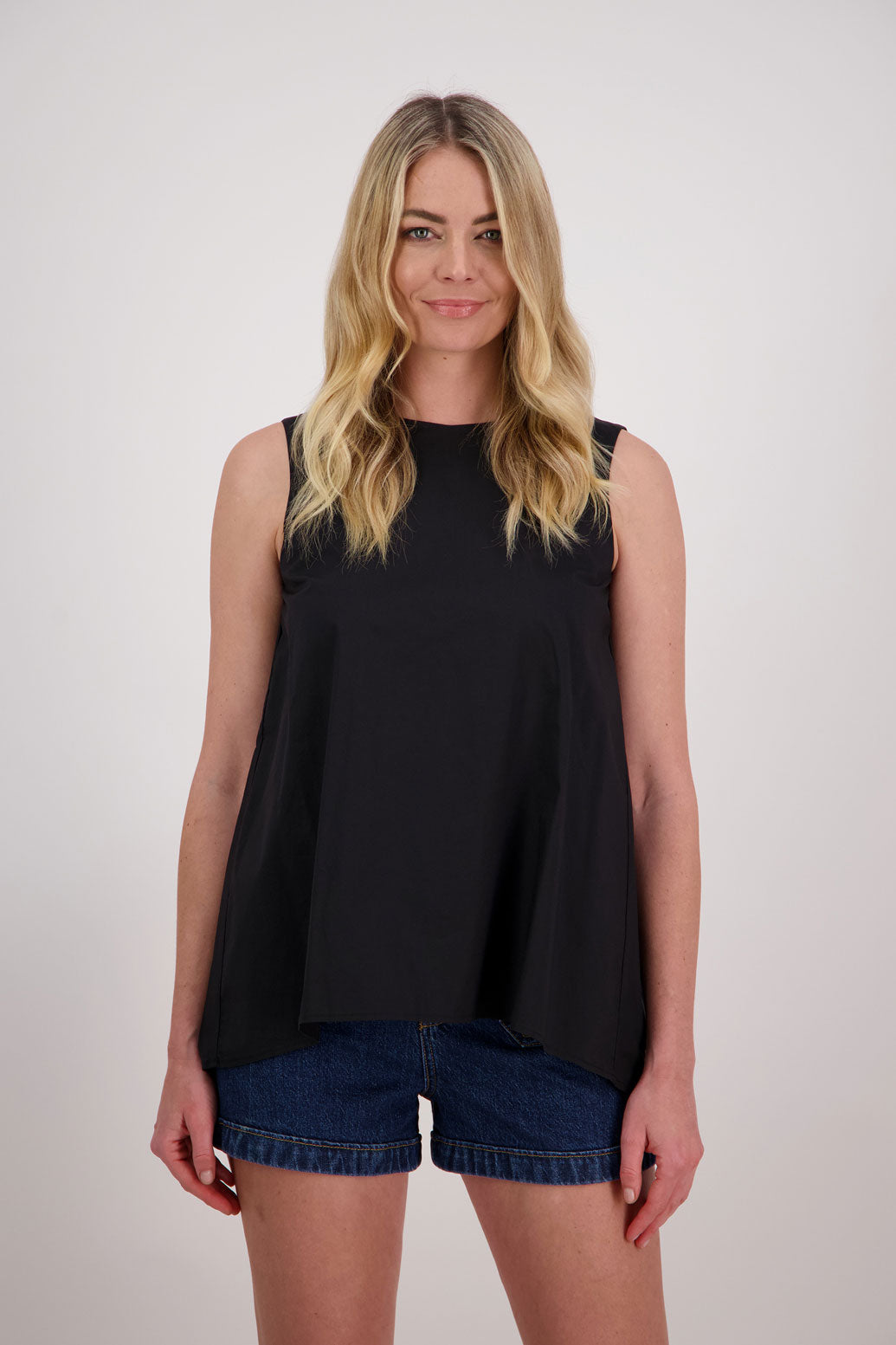 Patsy sleeveless wide shoulder twist back top in Cotton, Black