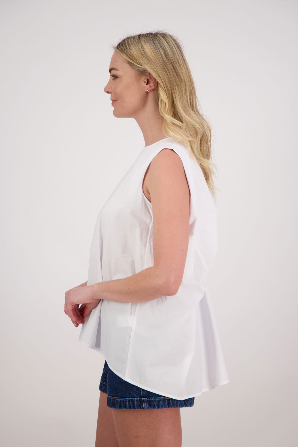 Patsy sleeveless wide shoulder twist back top in Cotton, White