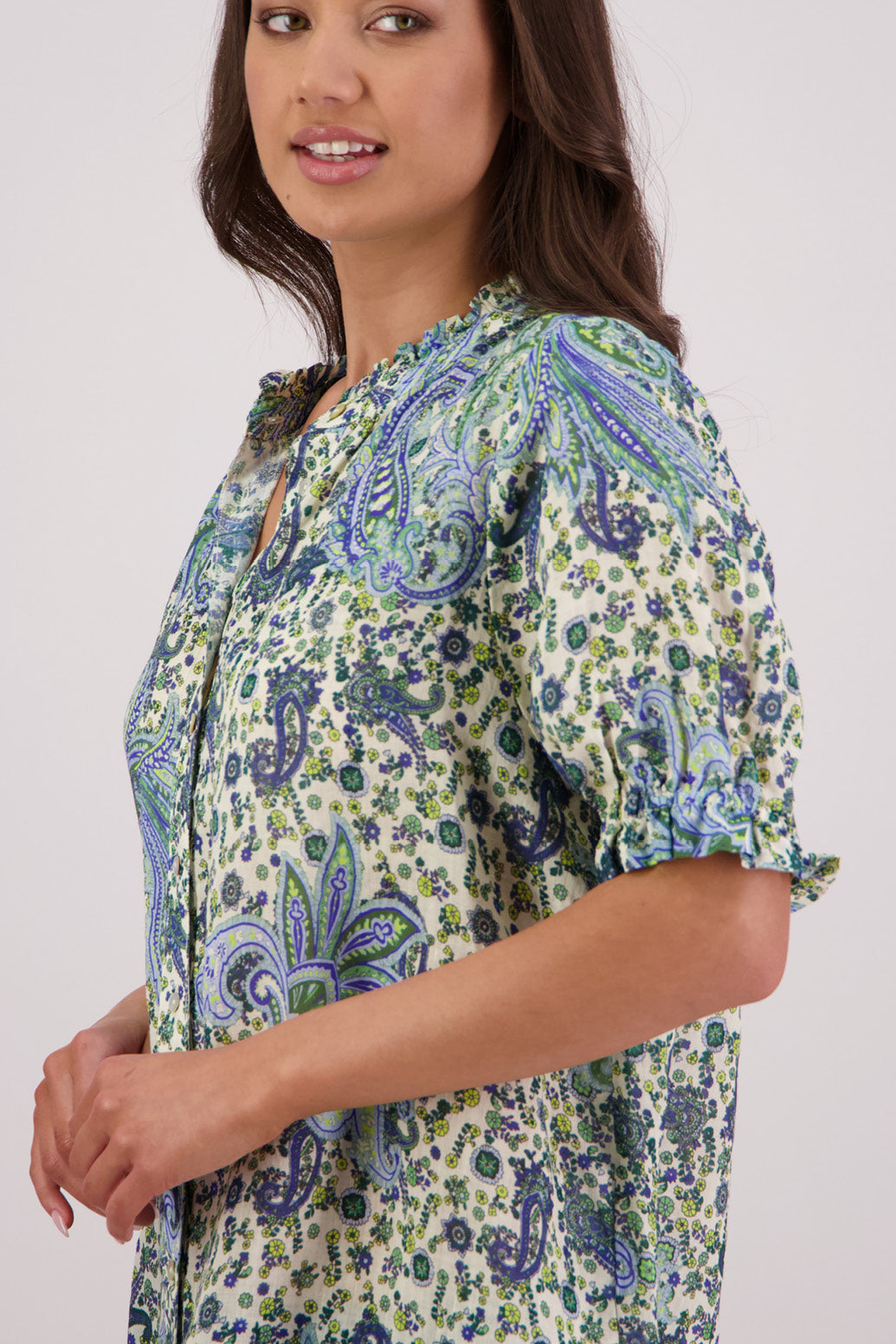 Close up of side view of Briarwood Pearly Shirt in Blue Paisley print.