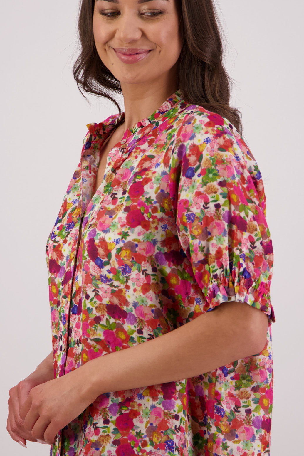 Close up of side view of Briarwood Pearly Shirt in Bright Floral print.