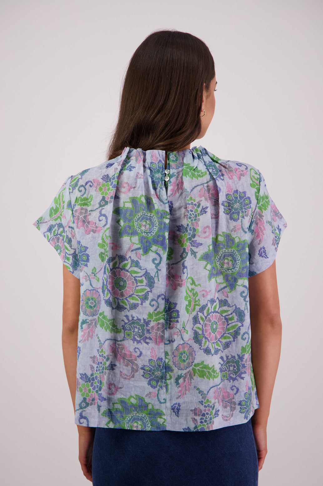 Back view of Briarwood Pia Top in Blue Floral print.