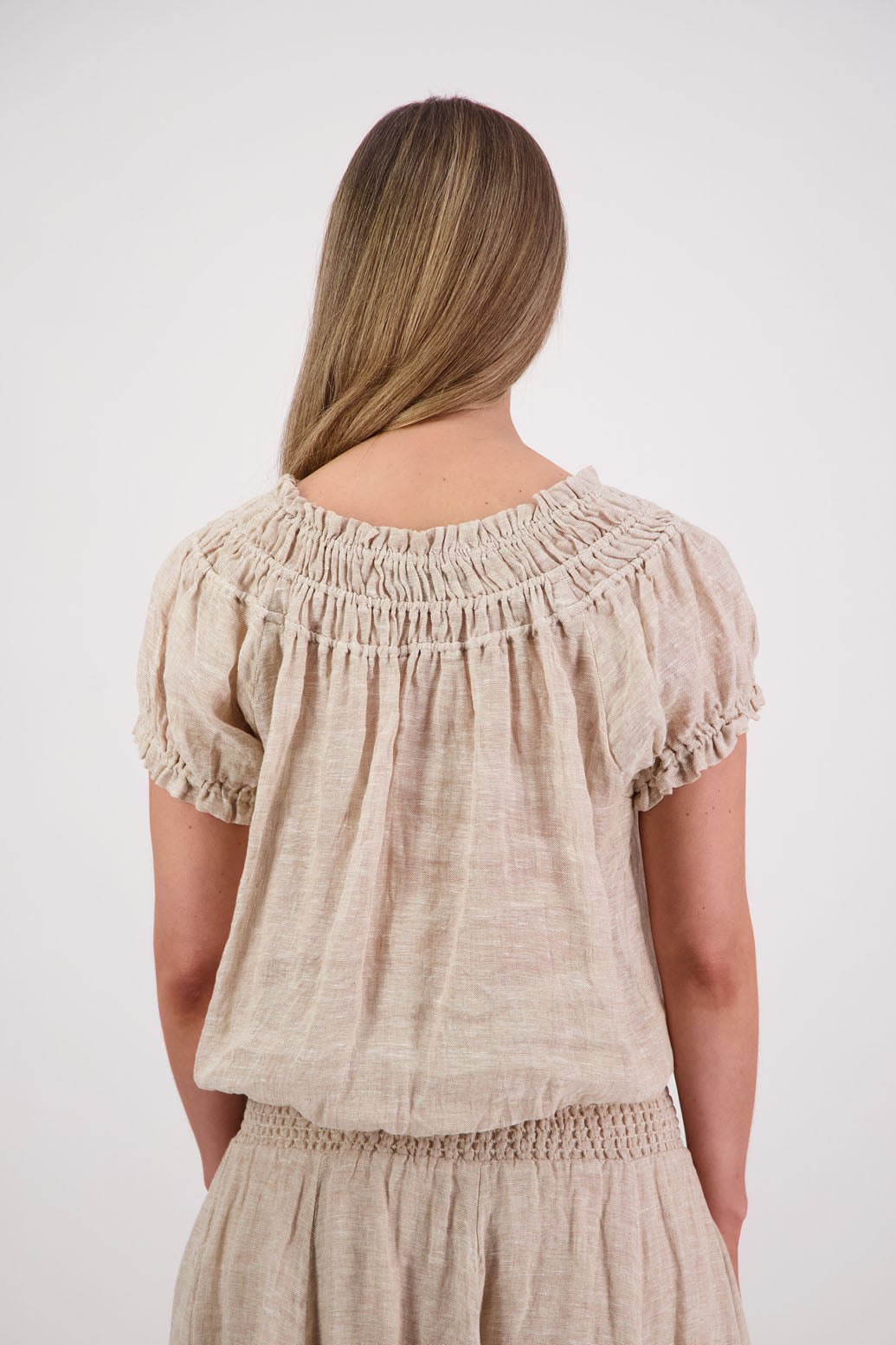 Womens short sleeve linen top with shirred neck and ruffle sleeve. Briarwood NZ. Polly, Natural