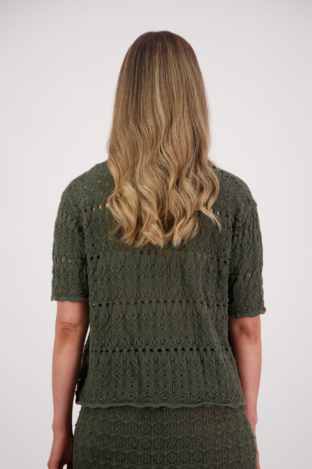 Womens knitted cotton lace short sleeve cardigan with shaped hem and scalloped edging. Briarwood NZ. Posy, Moss Green