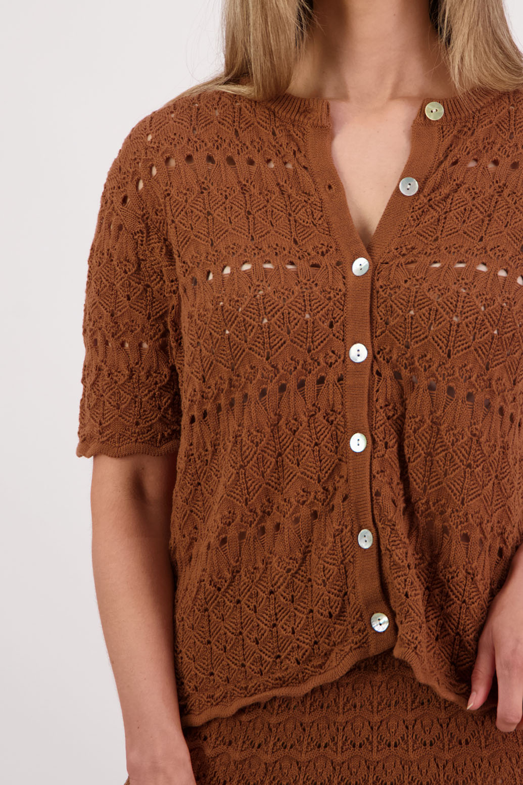 Womens knitted cotton lace short sleeve cardigan with shaped hem and scalloped edging. Briarwood NZ. Posy, Tan