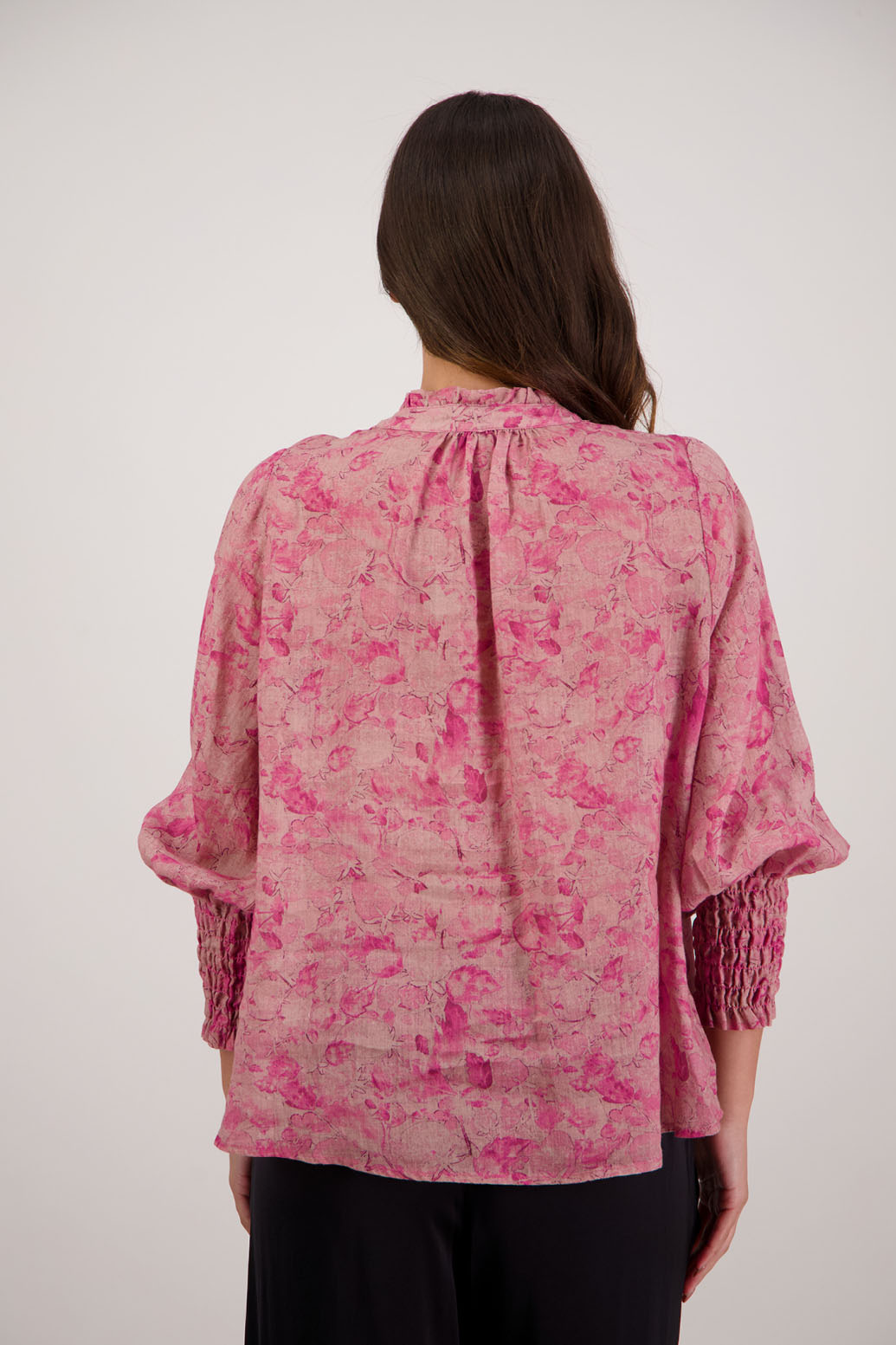 Raewyn Shirt in Pink Floral by Briarwood NZ. 100% Ramie shirt with long sleeves, ruffle neckline, shirred waist and button front.