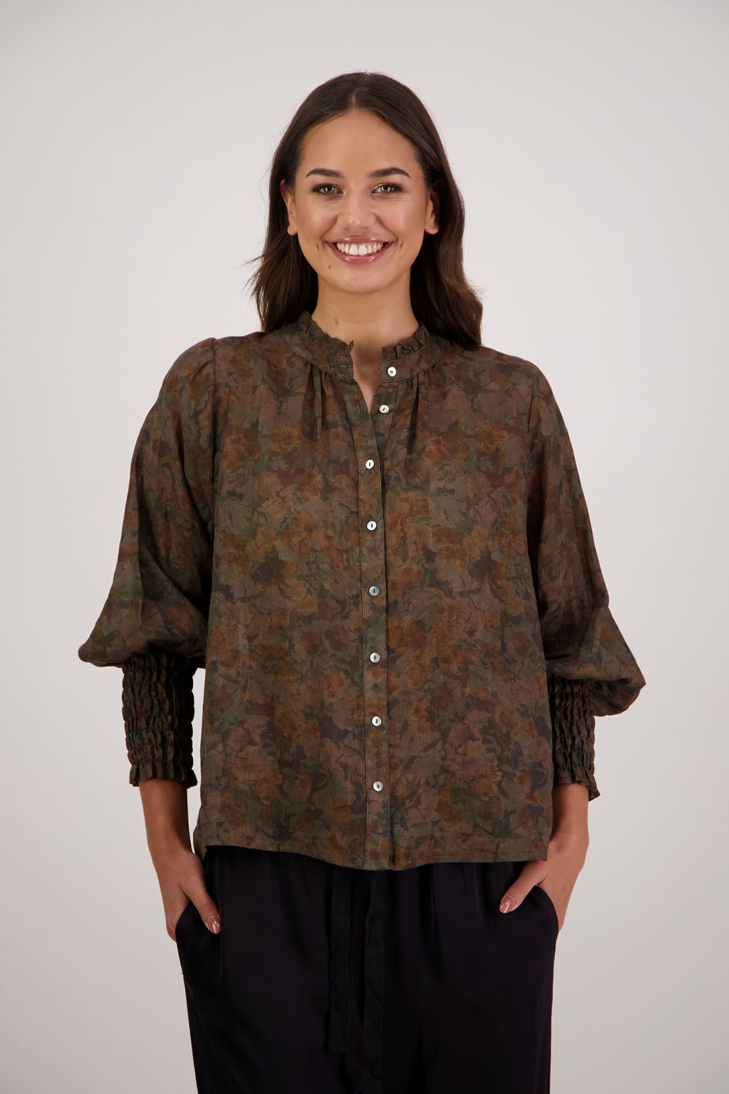 Raewyn Shirt in Vintage Floral by Briarwood NZ. Lightweight 100% Ramie shirt with long sleeves, ruffle neckline, shirred waist and button front.