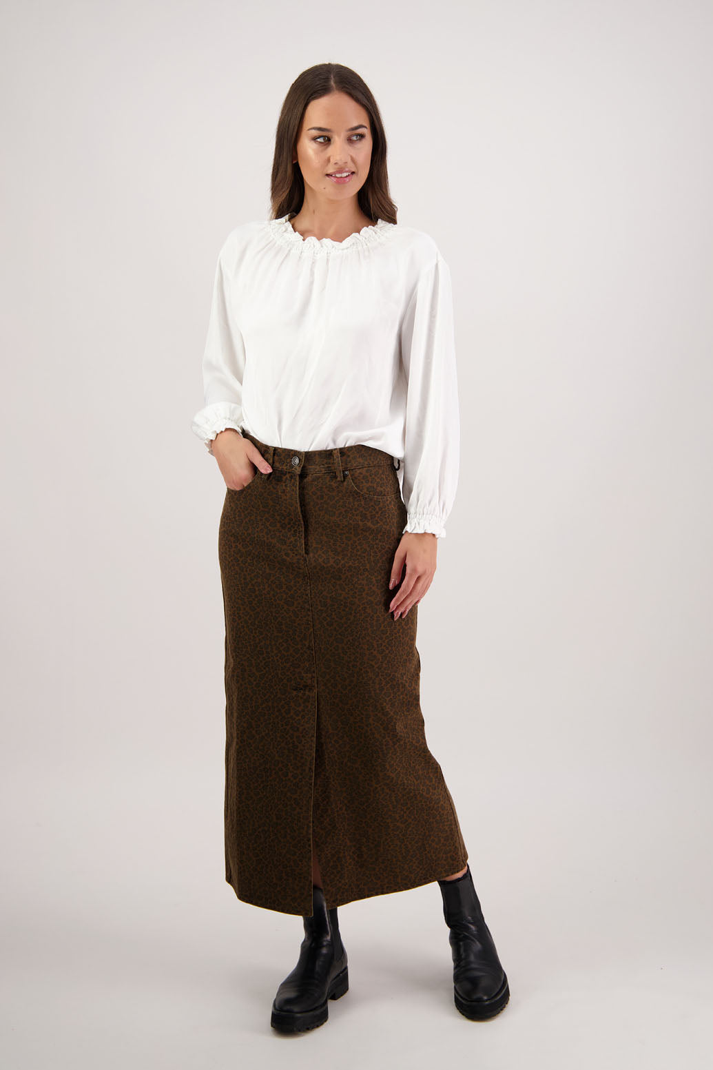 Rebel Denim Skirt in Tan Animal by Briarwood NZ. 100% cotton denim button through skirt, slight A-line, front pockets, stitched down panels