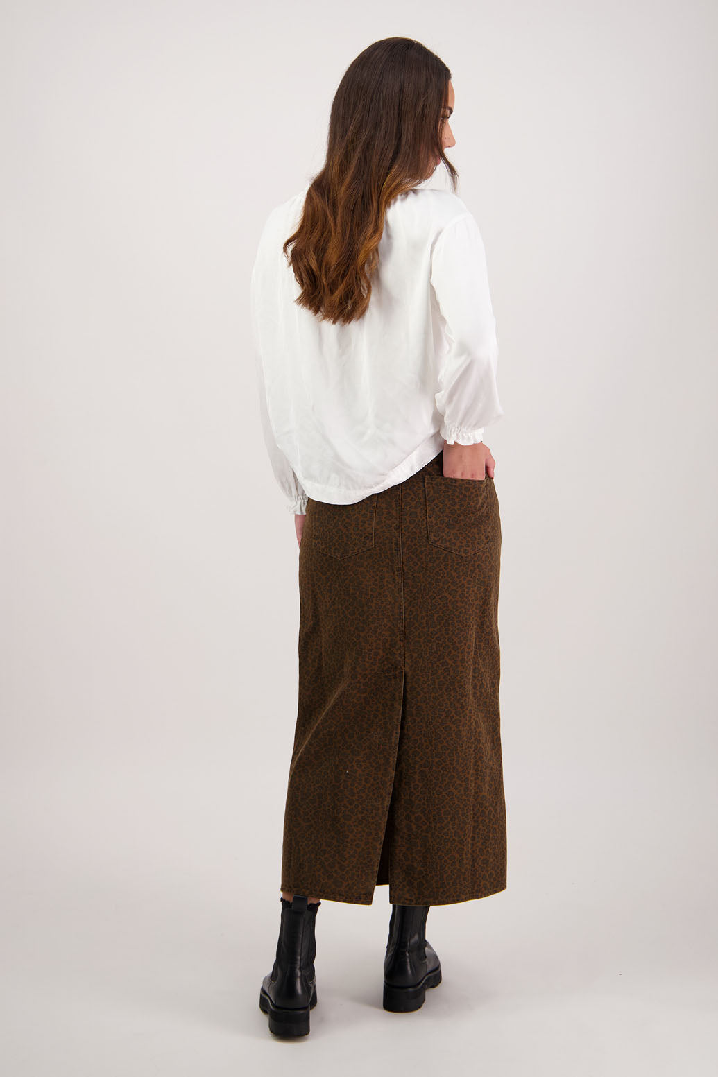 Rebel Denim Skirt in Tan Animal by Briarwood NZ. 100% cotton denim button through skirt, slight A-line, front pockets, stitched down panels