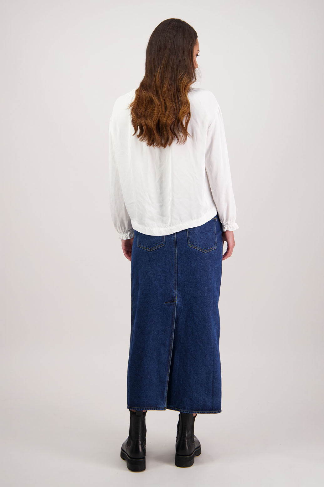 Remi Denim Skirt by Briarwood NZ. 100% cotton skirt, a long straight fit skirt with splits front & back, pockets front + back, zip closure