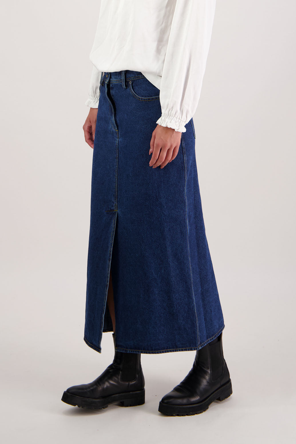 Remi Denim Skirt by Briarwood NZ. 100% cotton skirt, a long straight fit skirt with splits front & back, pockets front + back, zip closure