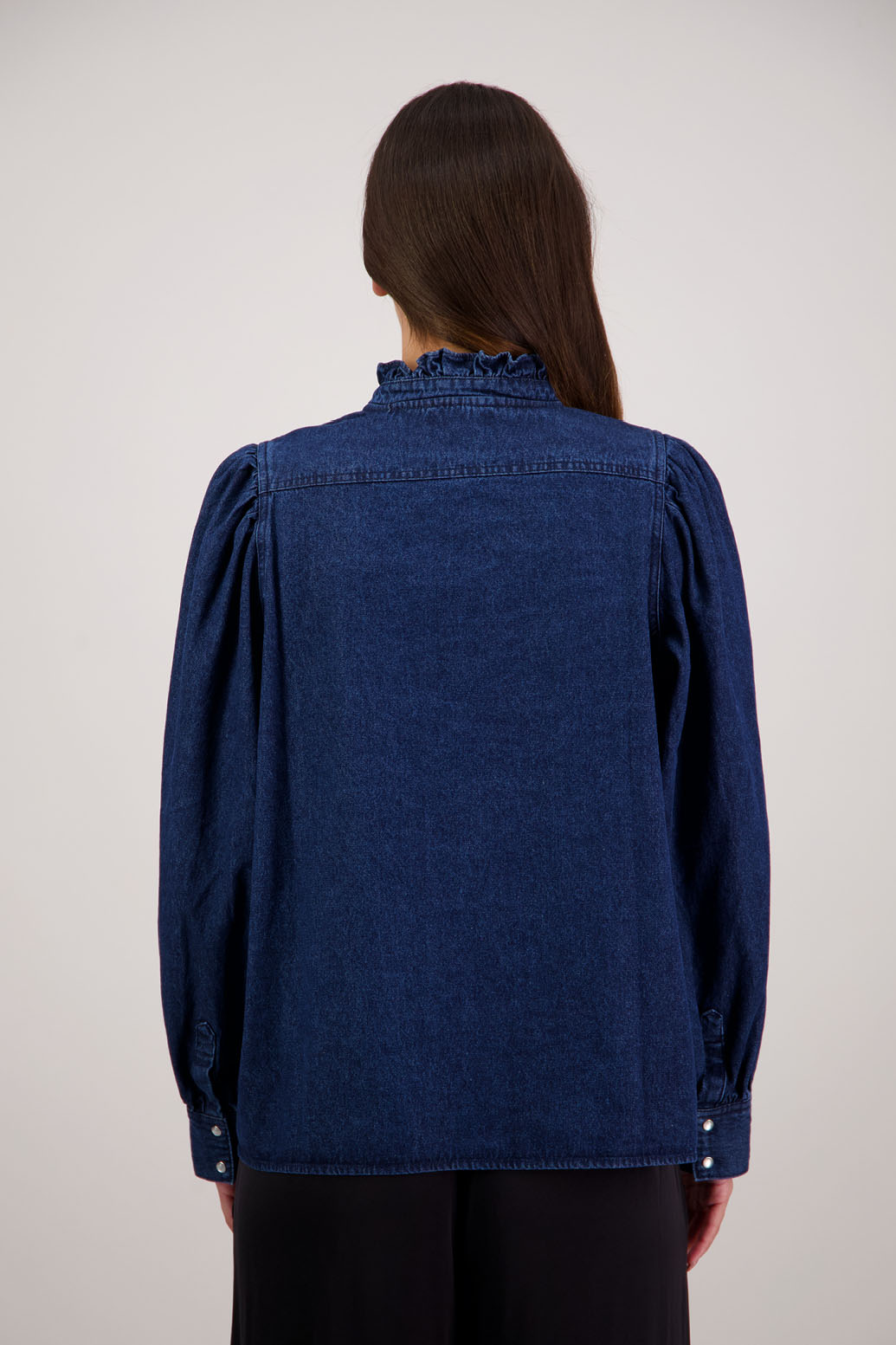 Ricci Denim Shirt by Briarwood NZ. 100% cotton shirt with full length sleeves, snap button closure, ruffles around neck