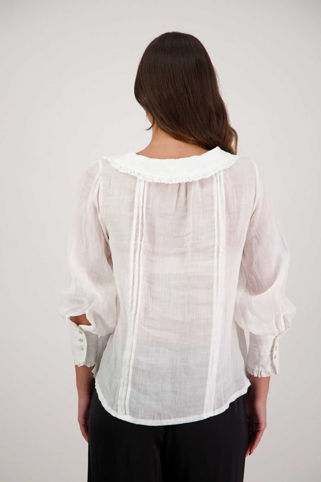 Richie White Top by Briarwood NZ. 100% ramie top with shaped ruffle collar and tie detail. Designed in New Zealand.