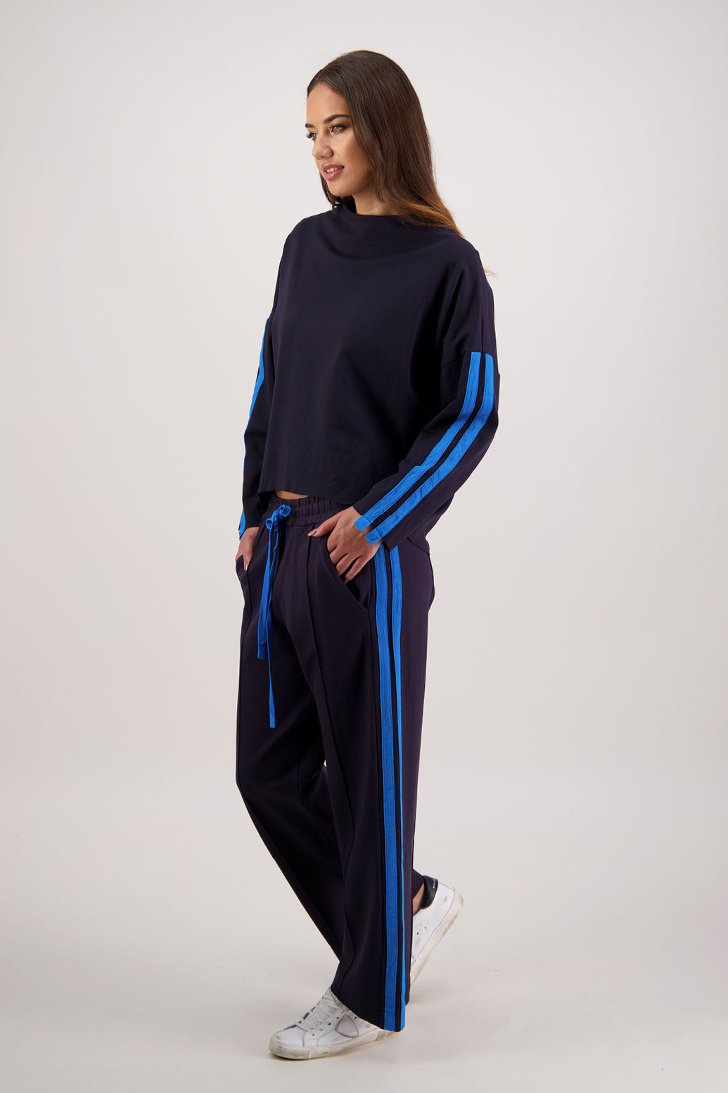 Rick Pant in Ink by Briarwood NZ. 100% Ponte pant with elasticated waist with draw cord, pin tuck front & back, double side stripe and pockets