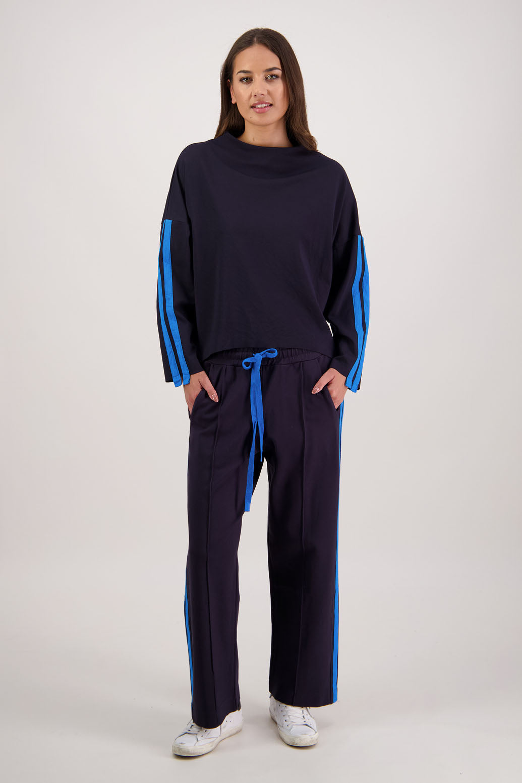 Rick Pant in Ink by Briarwood NZ. 100% Ponte pant with elasticated waist with draw cord, pin tuck front & back, double side stripe and pockets