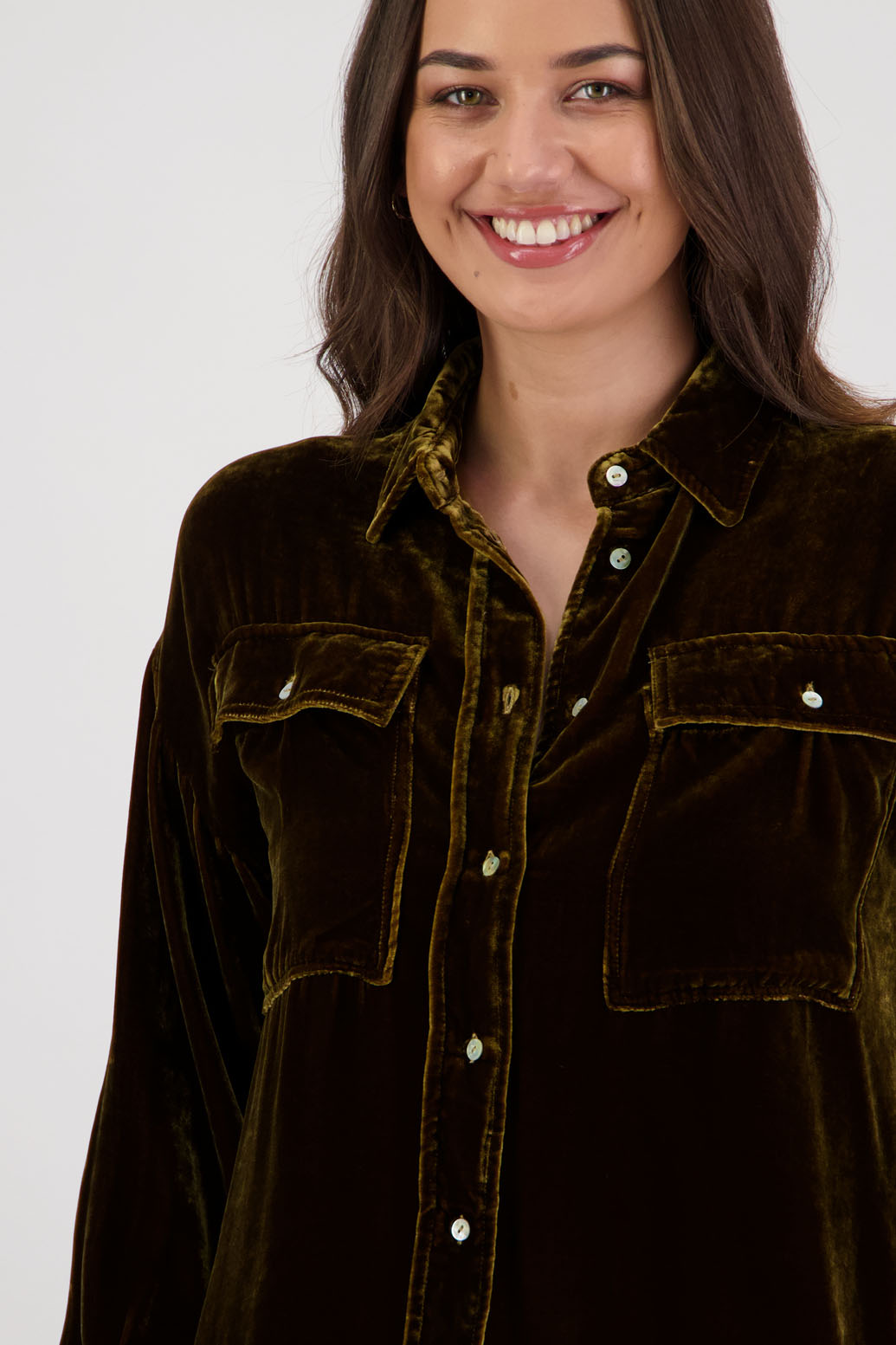 Ridge Shirt in Tan Velvet by Briarwood NZ. A
18% Silk, 82% Rayon Velvet collared button through shirt with full length sleeves, longer at the back, side splits, pockets on front
