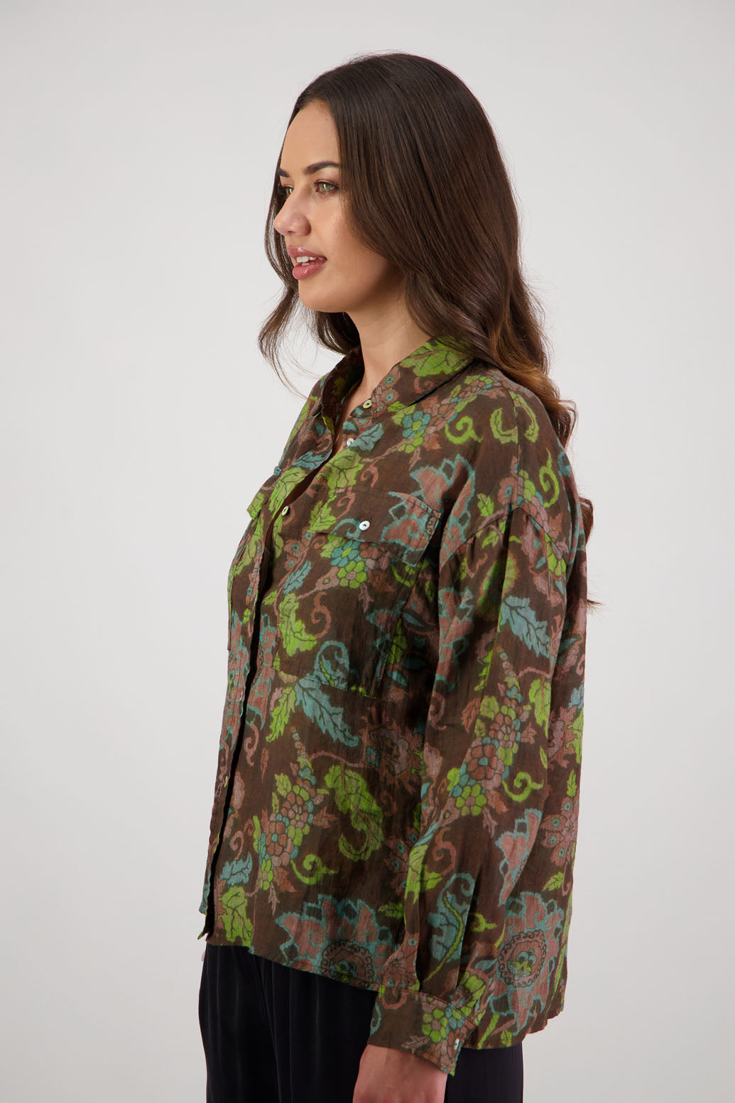 Ripley Shirt in Brown Floral by Briarwood NZ. 100% Ramie collared button through shirt, full length sleeves, longer at the back, side splits, pockets on the front