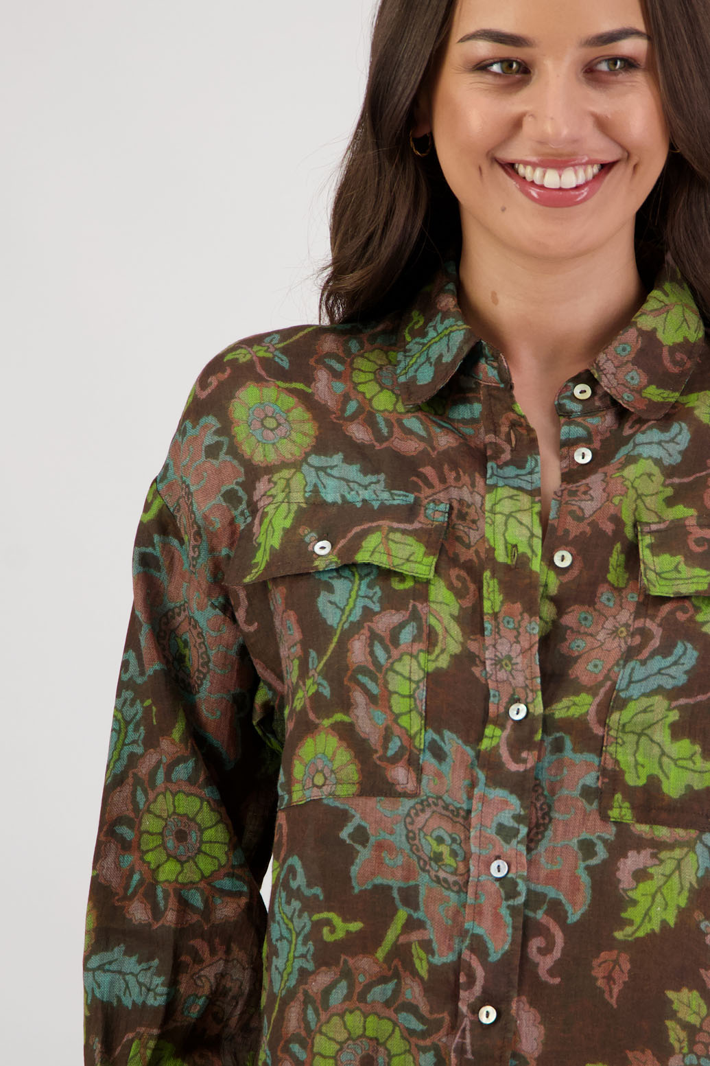 Ripley Shirt in Brown Floral by Briarwood NZ. 100% Ramie collared button through shirt, full length sleeves, longer at the back, side splits, pockets on the front