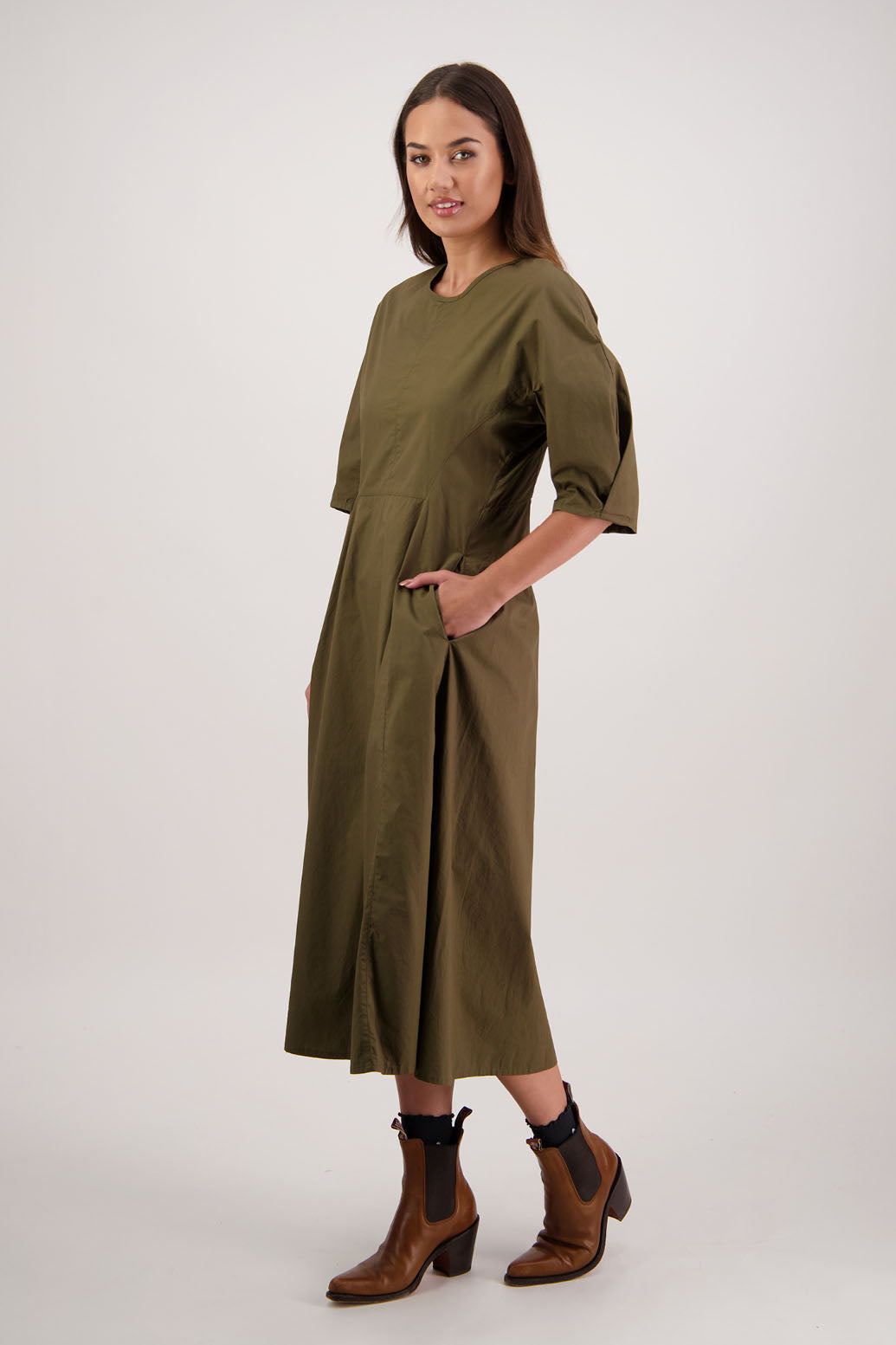 River Khaki Cotton Dress. Briarwood NZ. 3/4 Sleeves with pleat, Shaped through waist, Pockets in front seam, Back zip