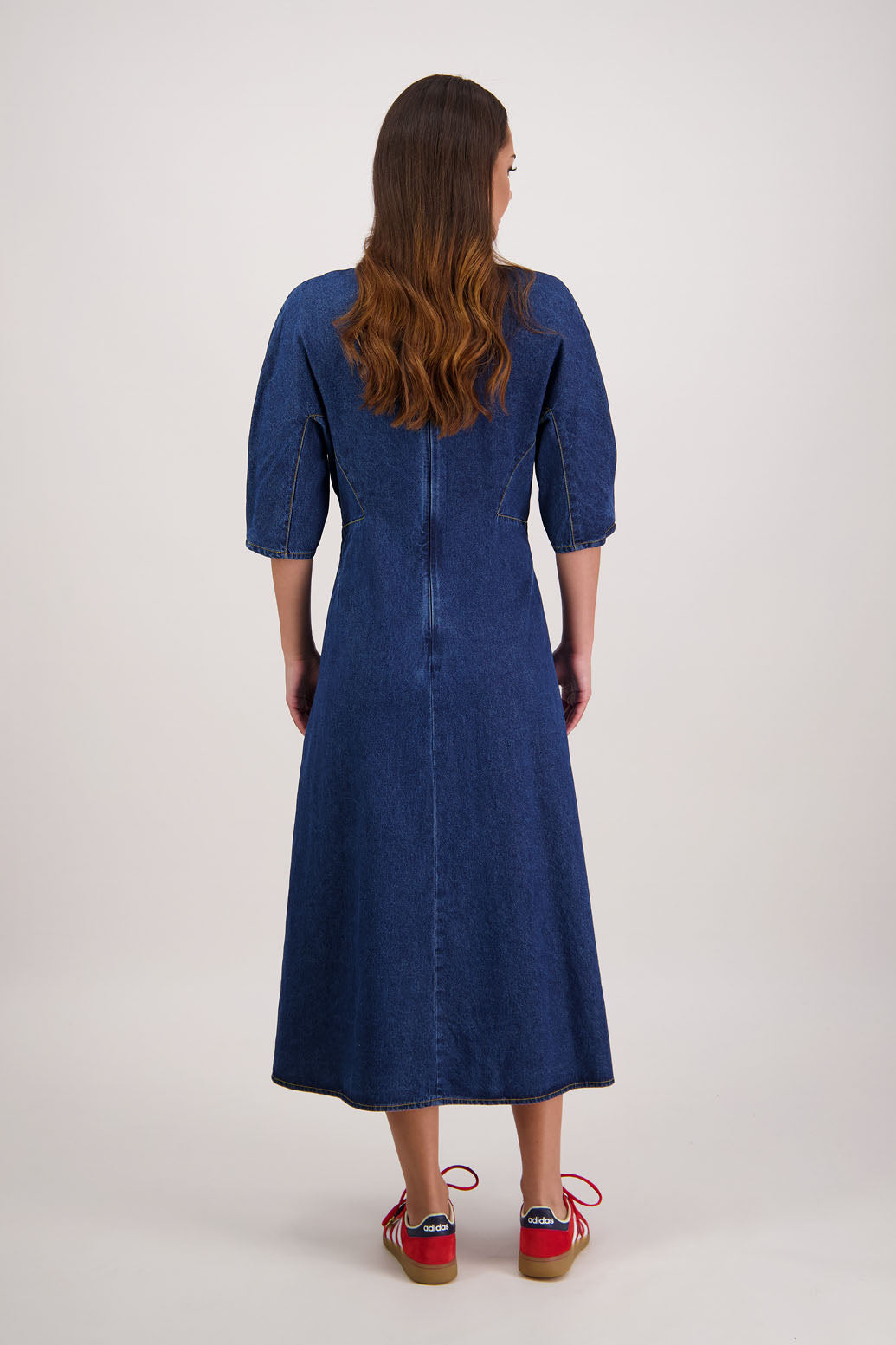 Rizzo Denim Dress by Briarwood NZ. 100% cotton dress, 3/4 sleeves with pleat, shaped through waist, pockets in front seam, back zip