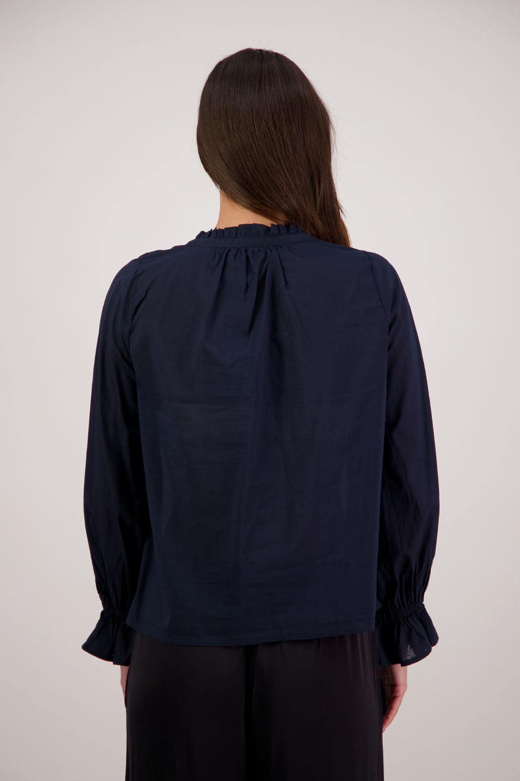 Briarwood NZ. Ink/Dark Blue long sleeve shirt, Elasticated sleeves, Ruffles around neck, Buttoned through